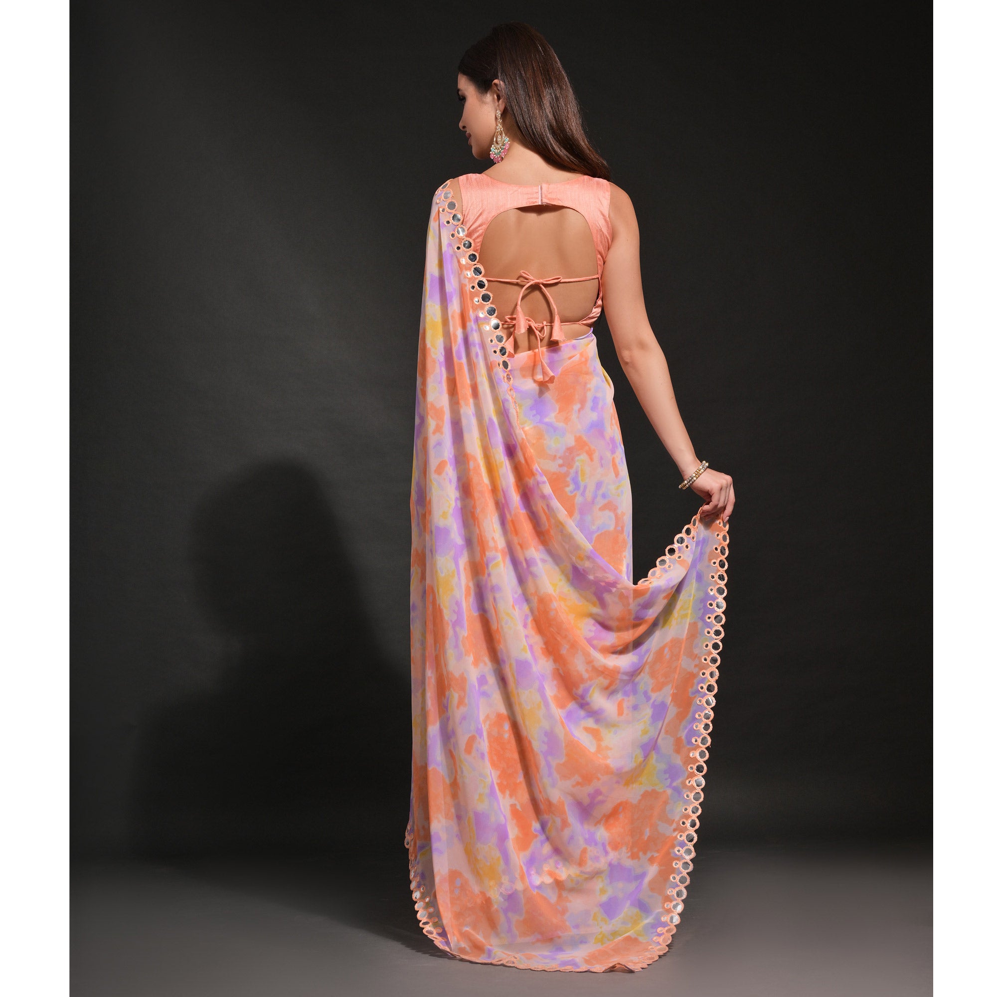 Peach Printed Georgette Saree With Embroidered Lace