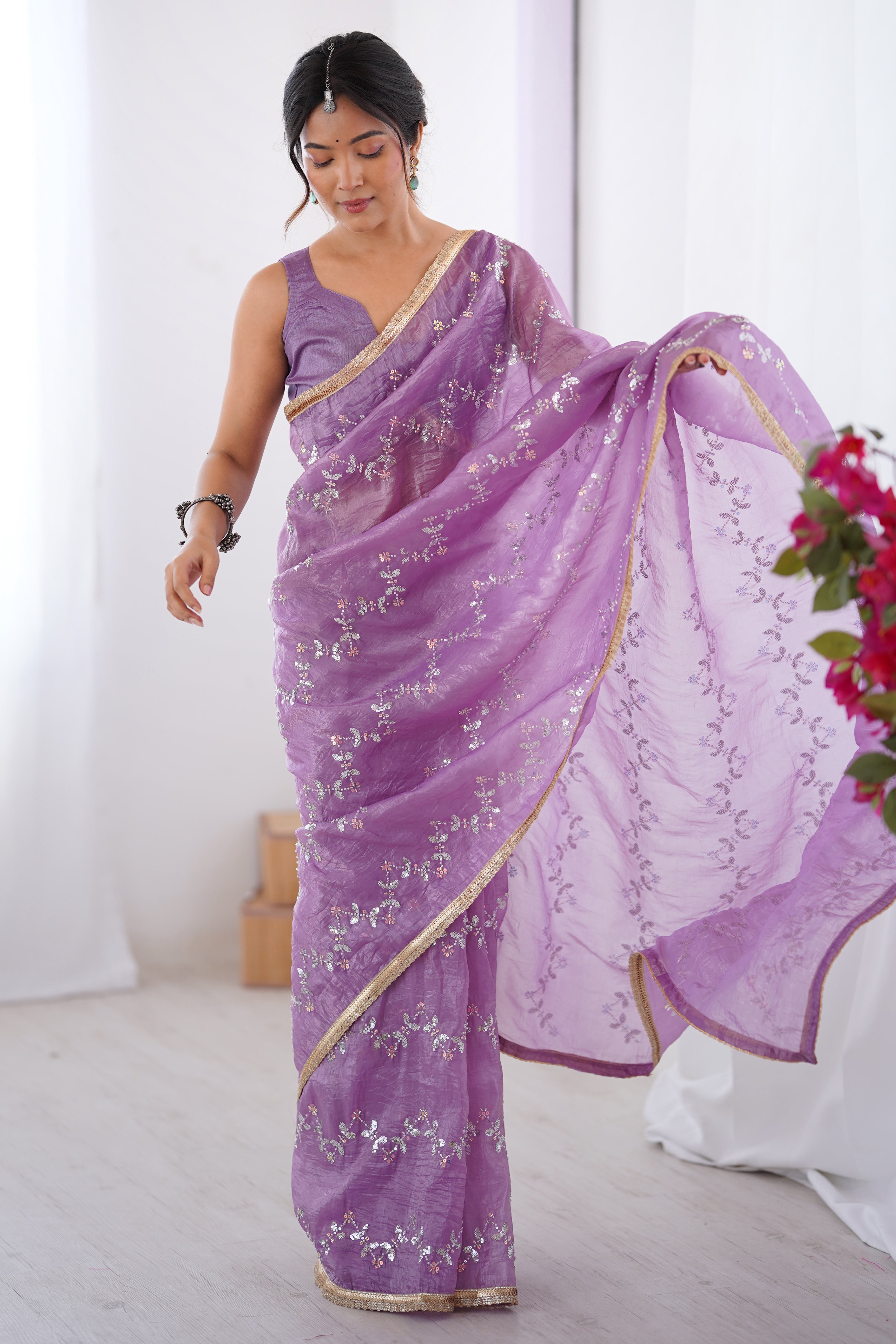 Dazzling Lavender Organza Saree Accented with Sequin, Bead & Stone Work and Delicate Lace Detailing