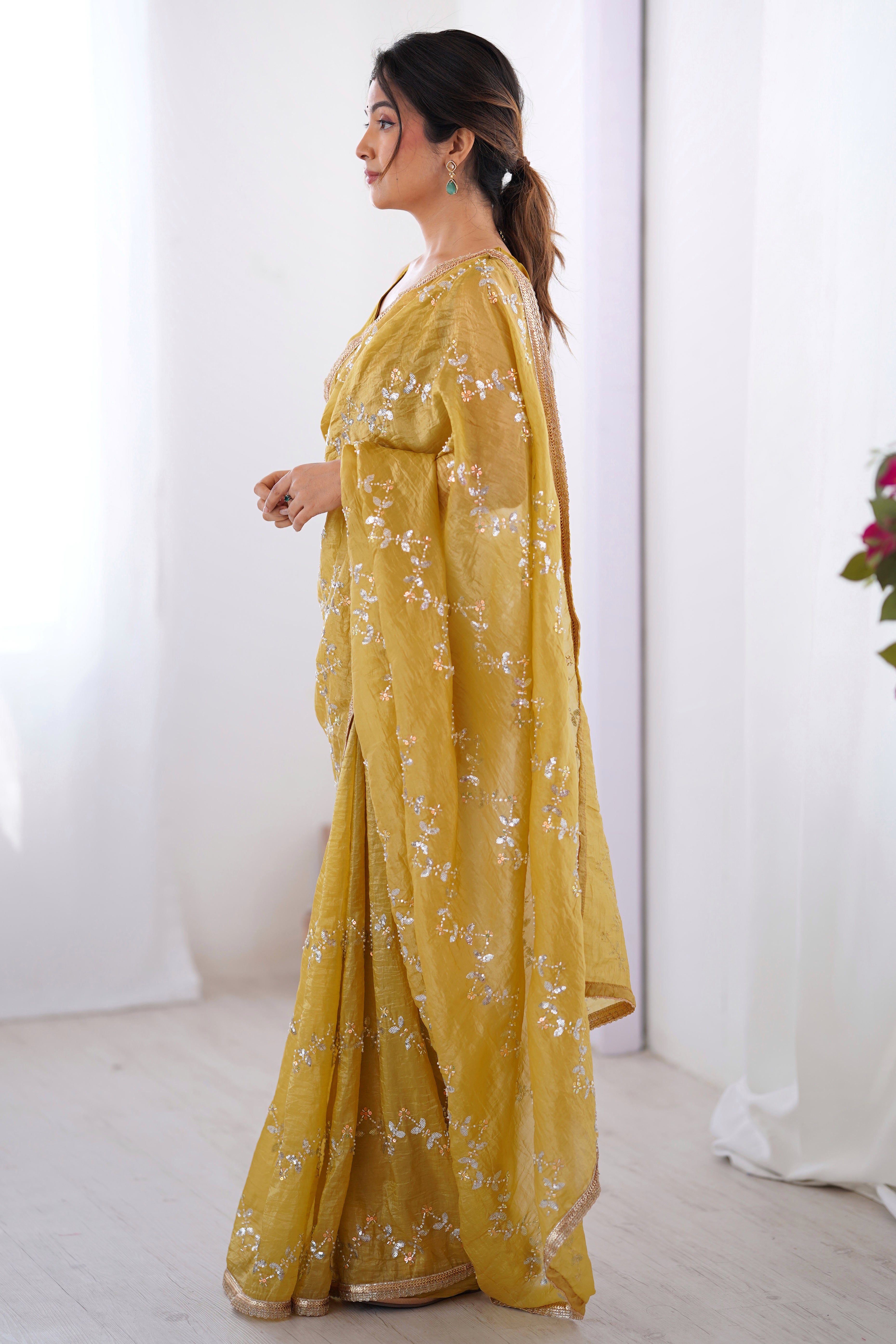 Dazzling Mustard Yellow Organza Saree Accented with Sequin, Bead & Stone Work and Delicate Lace Detailing