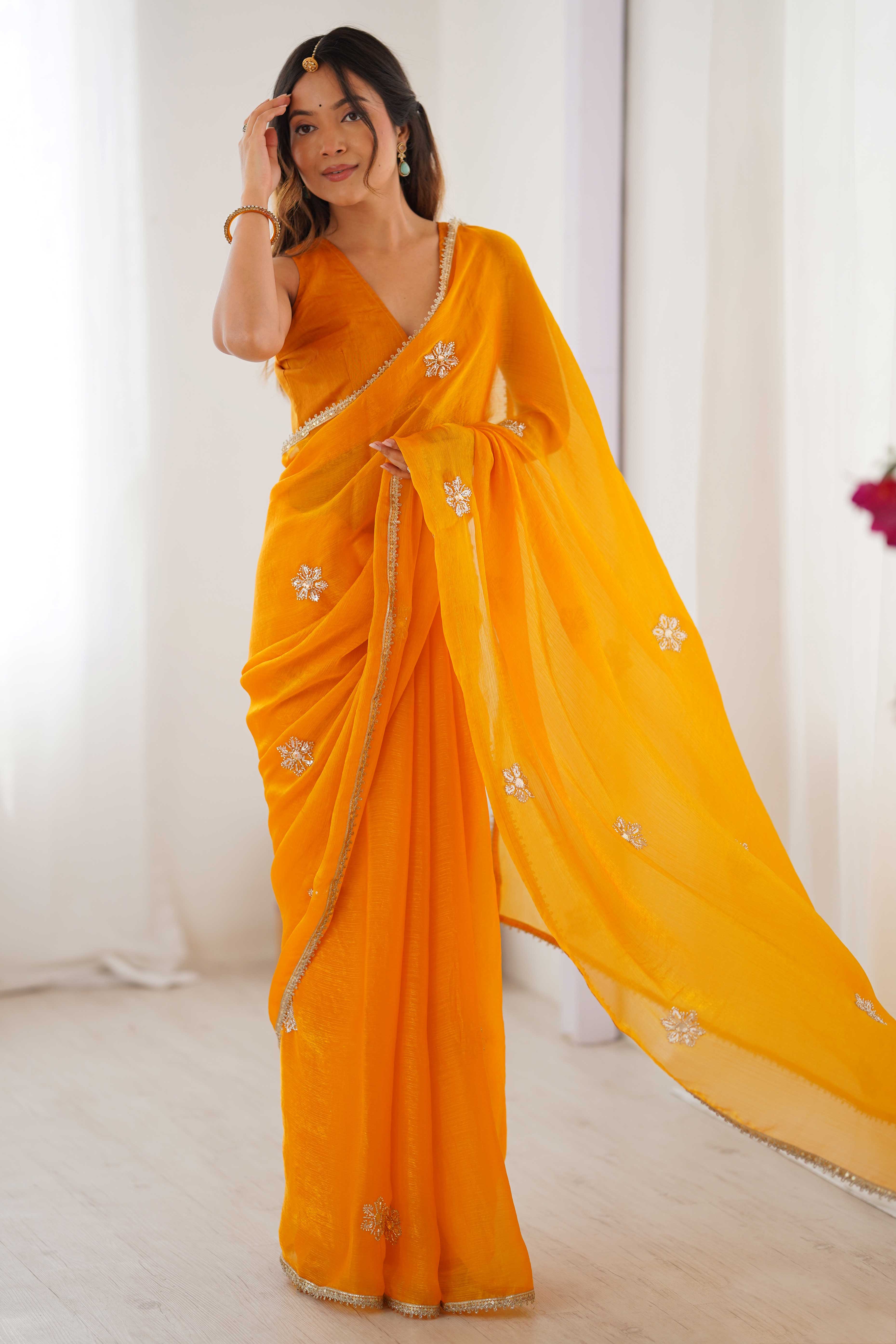Mustard Yellow Organza Saree Embellished with Intricate Floral Work and Elegant Lace Detailing