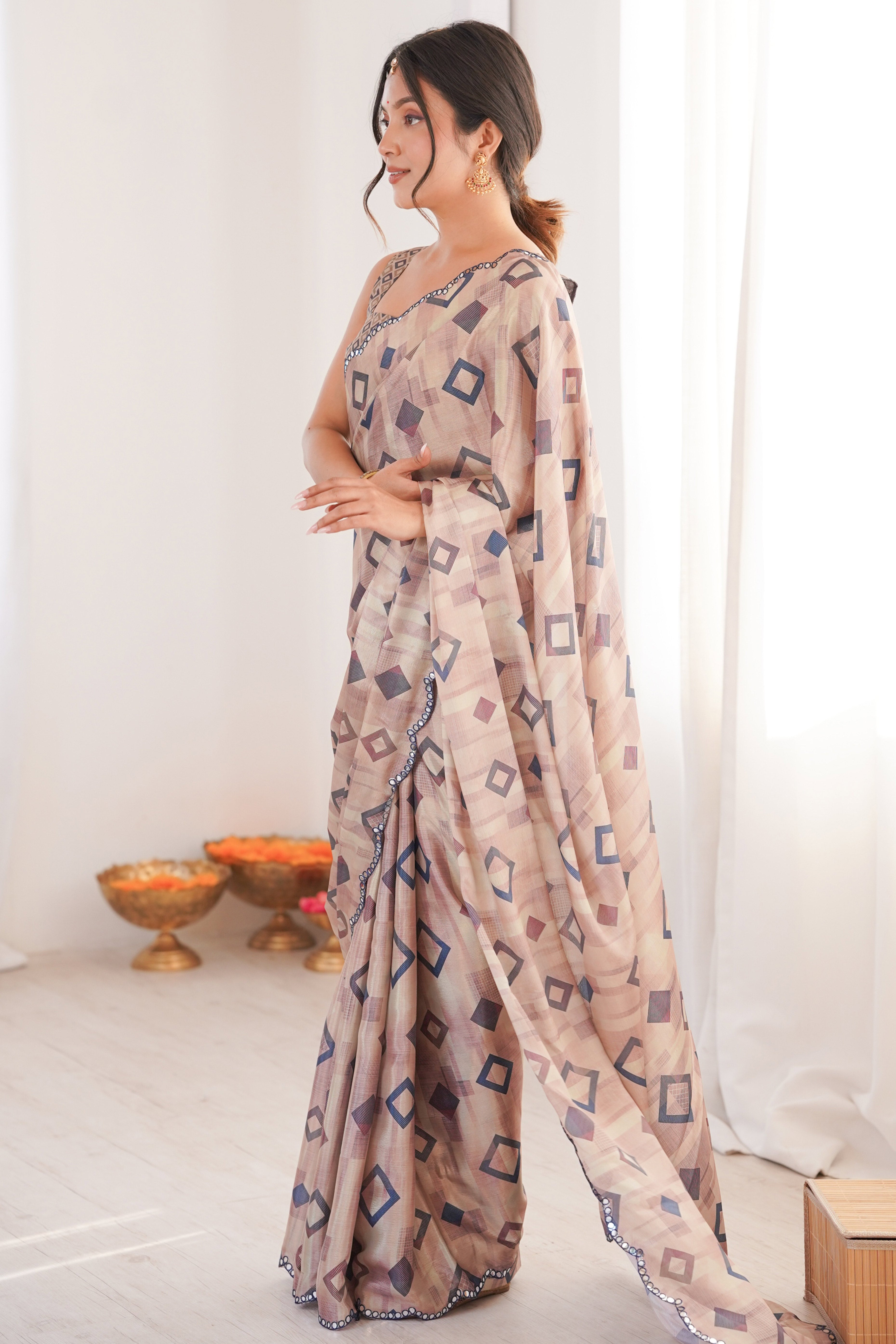 Elegant Cream Geometric Digital Printed Chinon Saree Accented With Intricate Embroidered Border