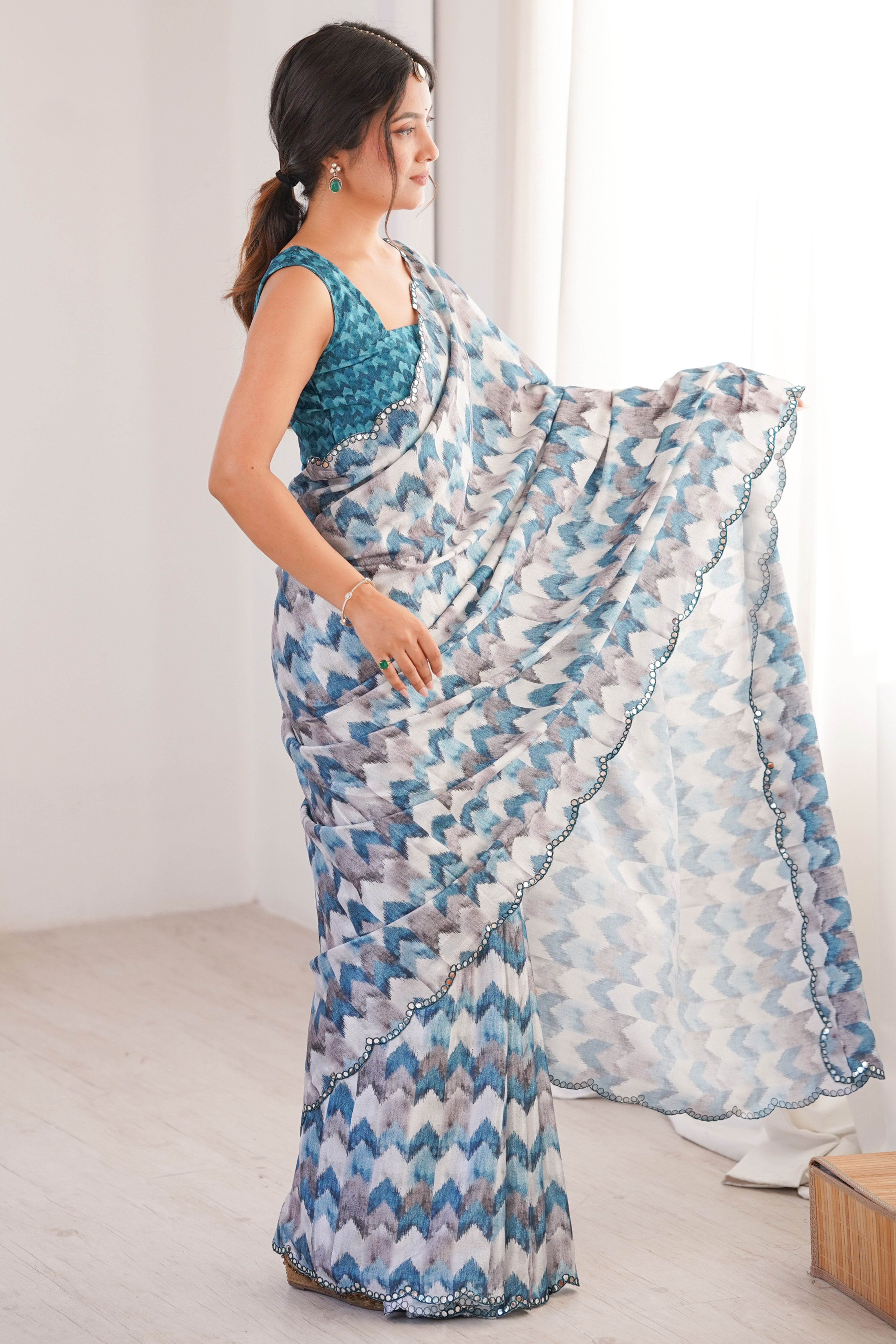 Elegant White Floral Digital Printed Chinon Saree Accented With Intricate Embroidered Border