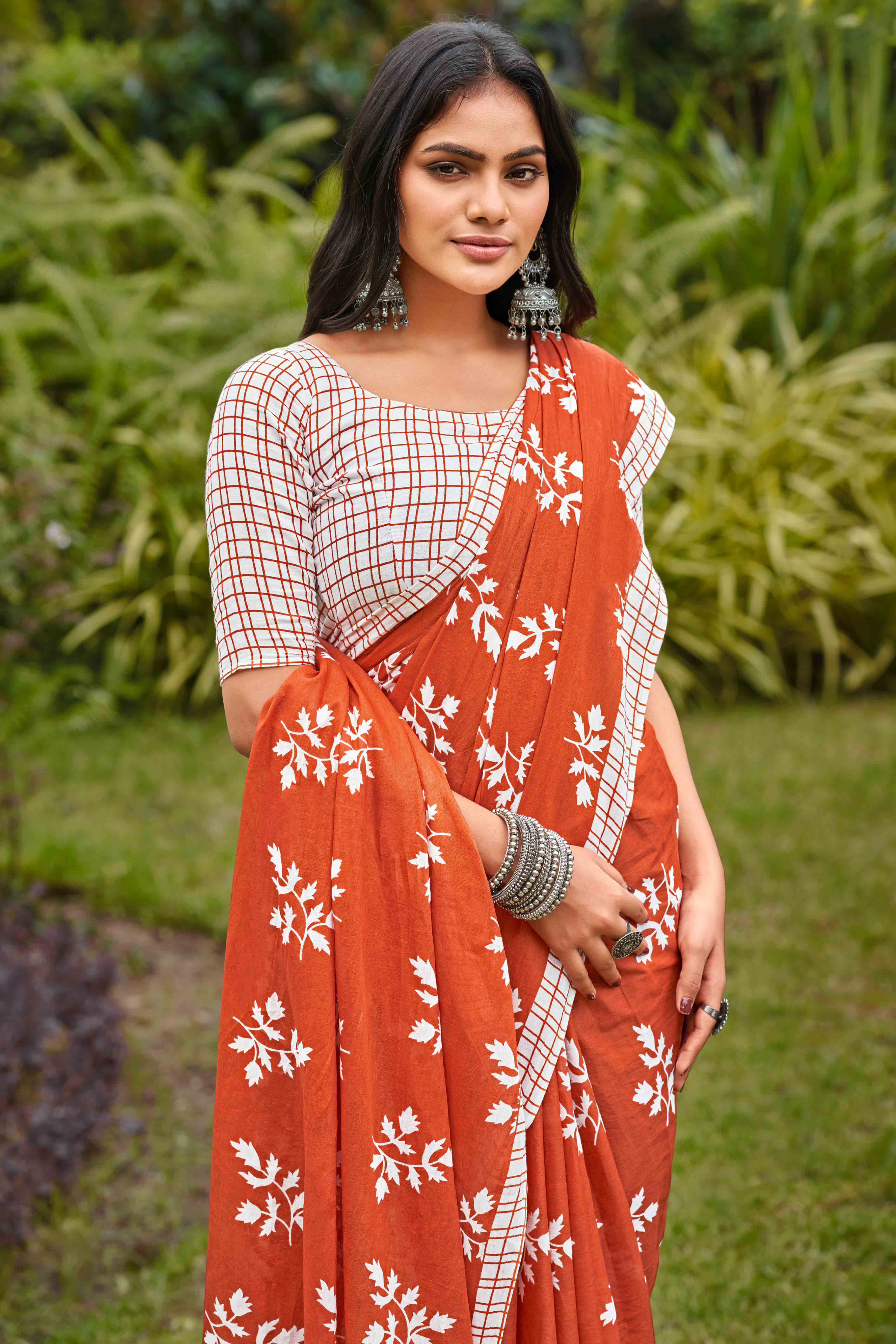 Rust Orange Pure Cotton Saree with Delicate Floral Patterns