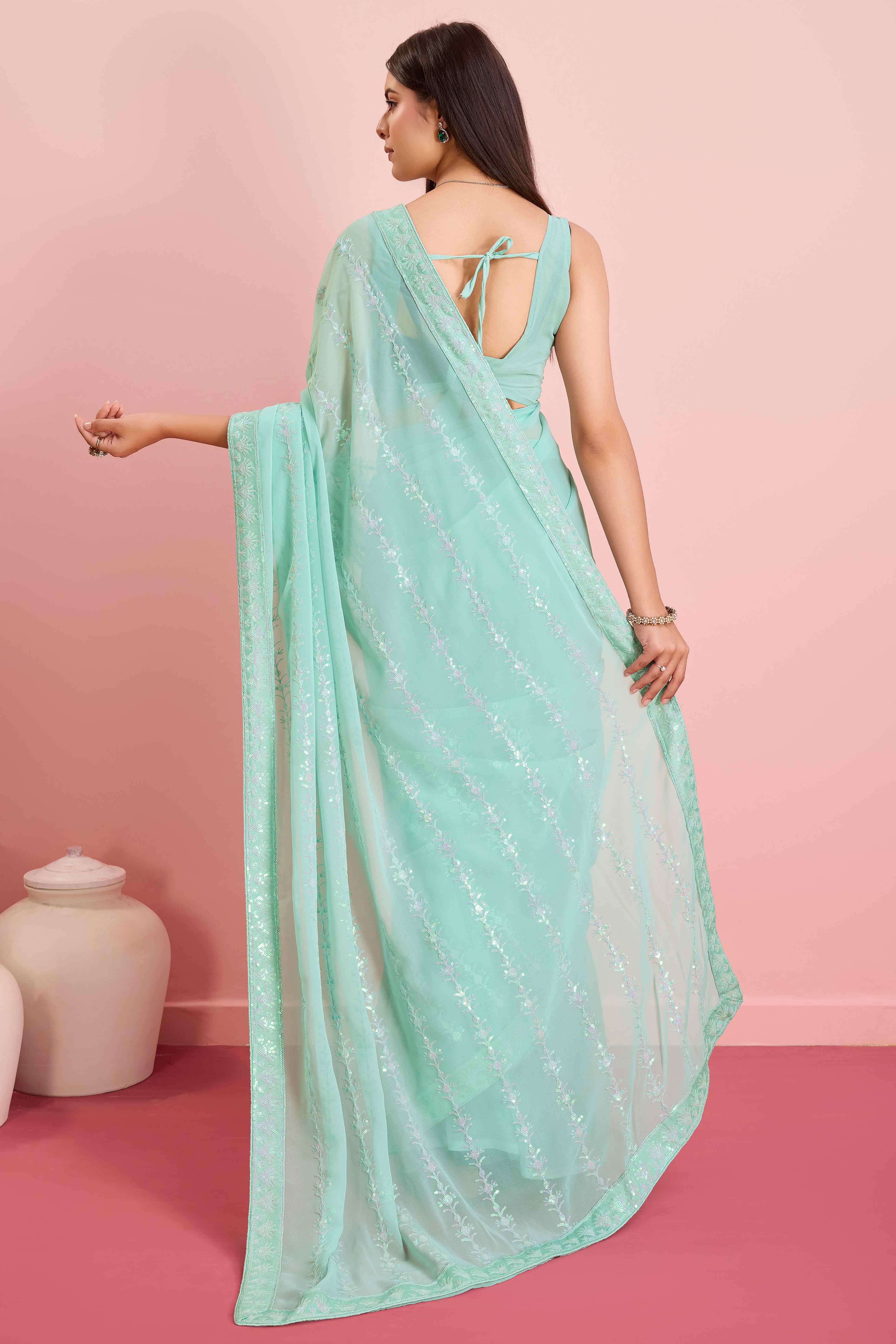 Turquoise Floral Sequins Embroidered Georgette Saree