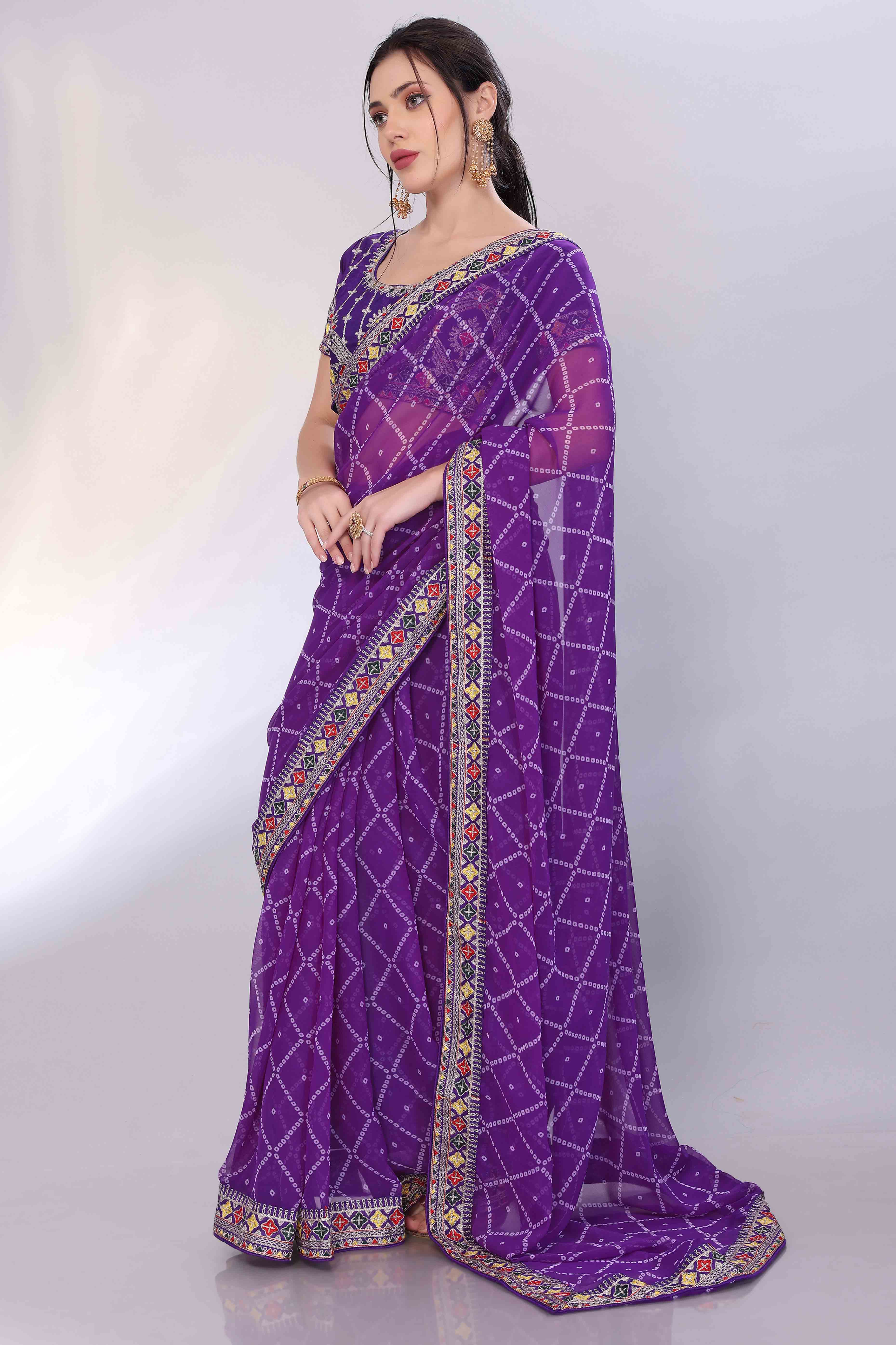 Purple Bandhani Printed Georgette Saree Framed With Elegant Embroidered Border