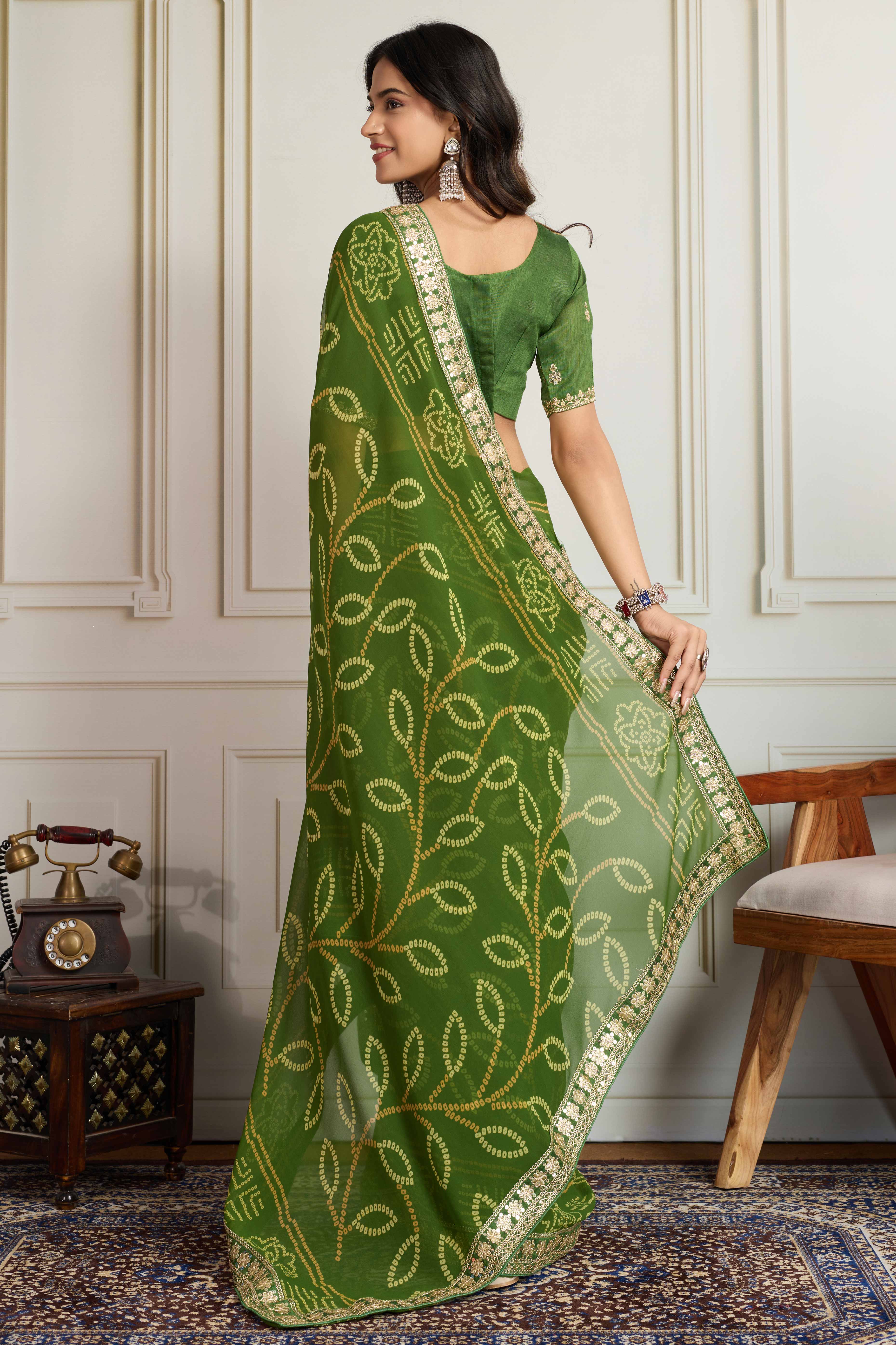 Green Bandhani Digital Printed Georgette Saree Enhanced With Cording Embroidered Border