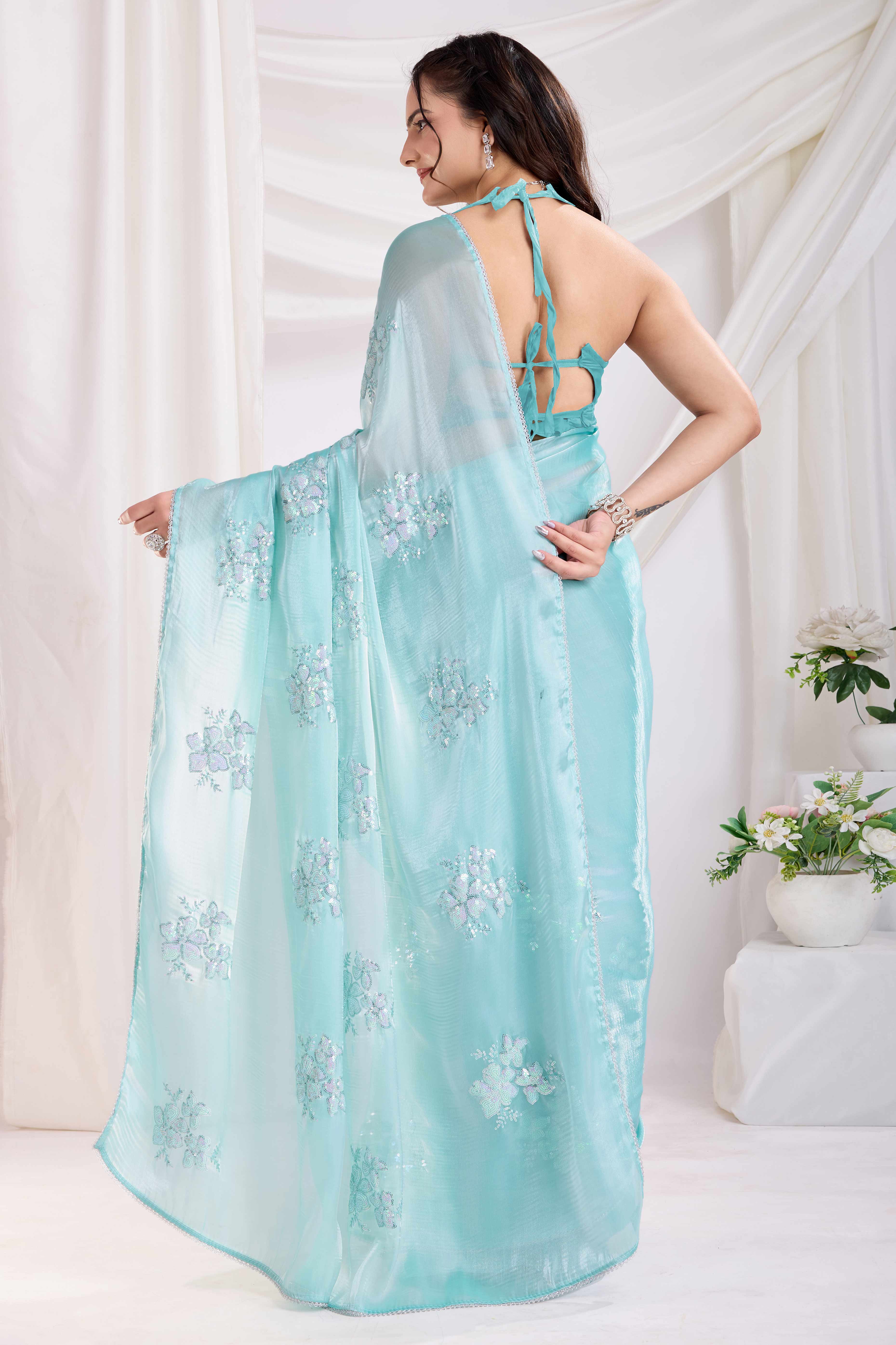 Turquoise Saree With Exquisite Floral Sequins Embroidery On Luxe Jimmy Choo Silk Blend