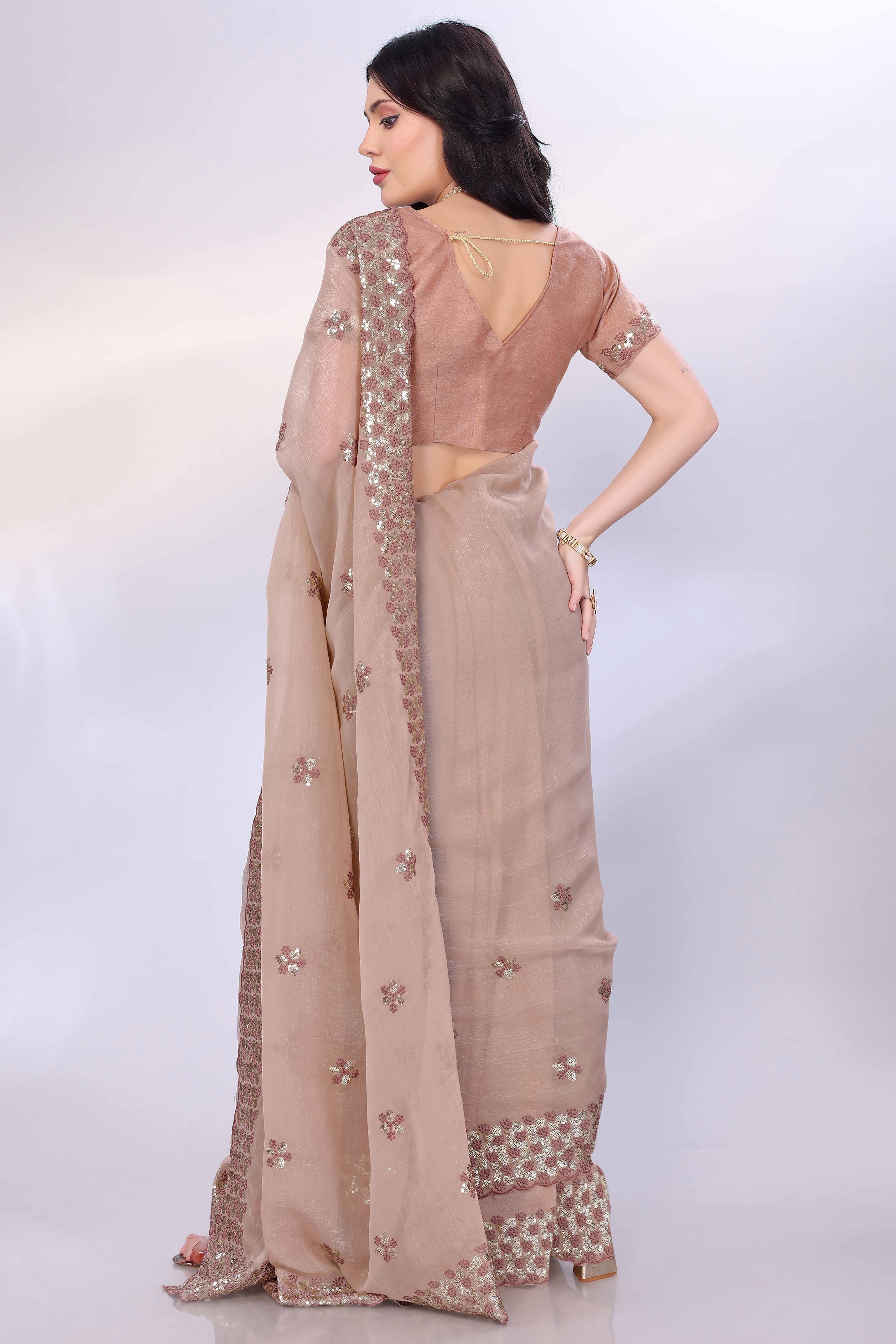 Beige Crunchy Organza Silk Saree Adorned With Intricate Floral Sequins Embroidery