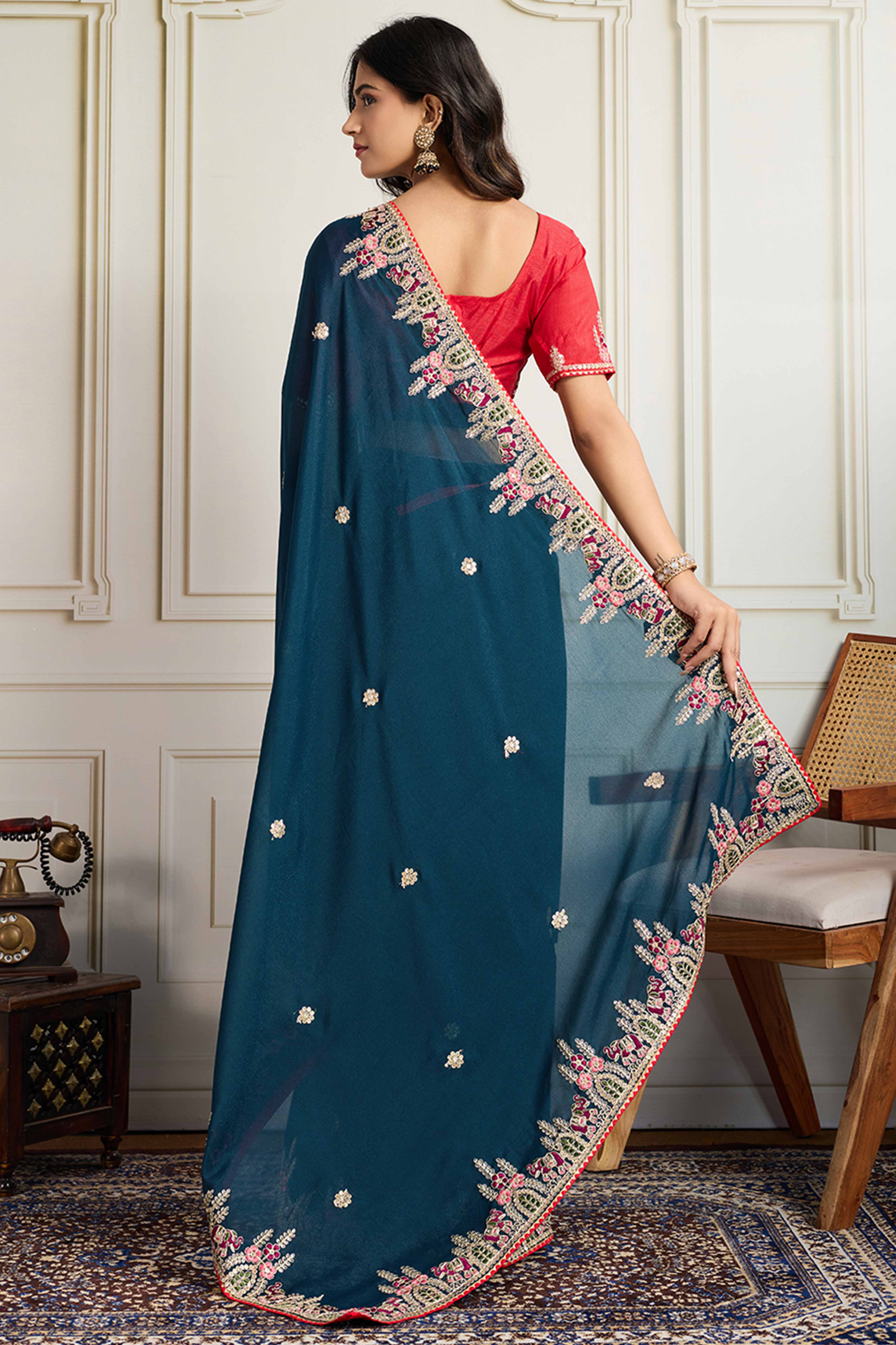 Dark Teal Blue Georgette Saree Featuring Floral Cording Embroidery & Shimmering Sequins Work