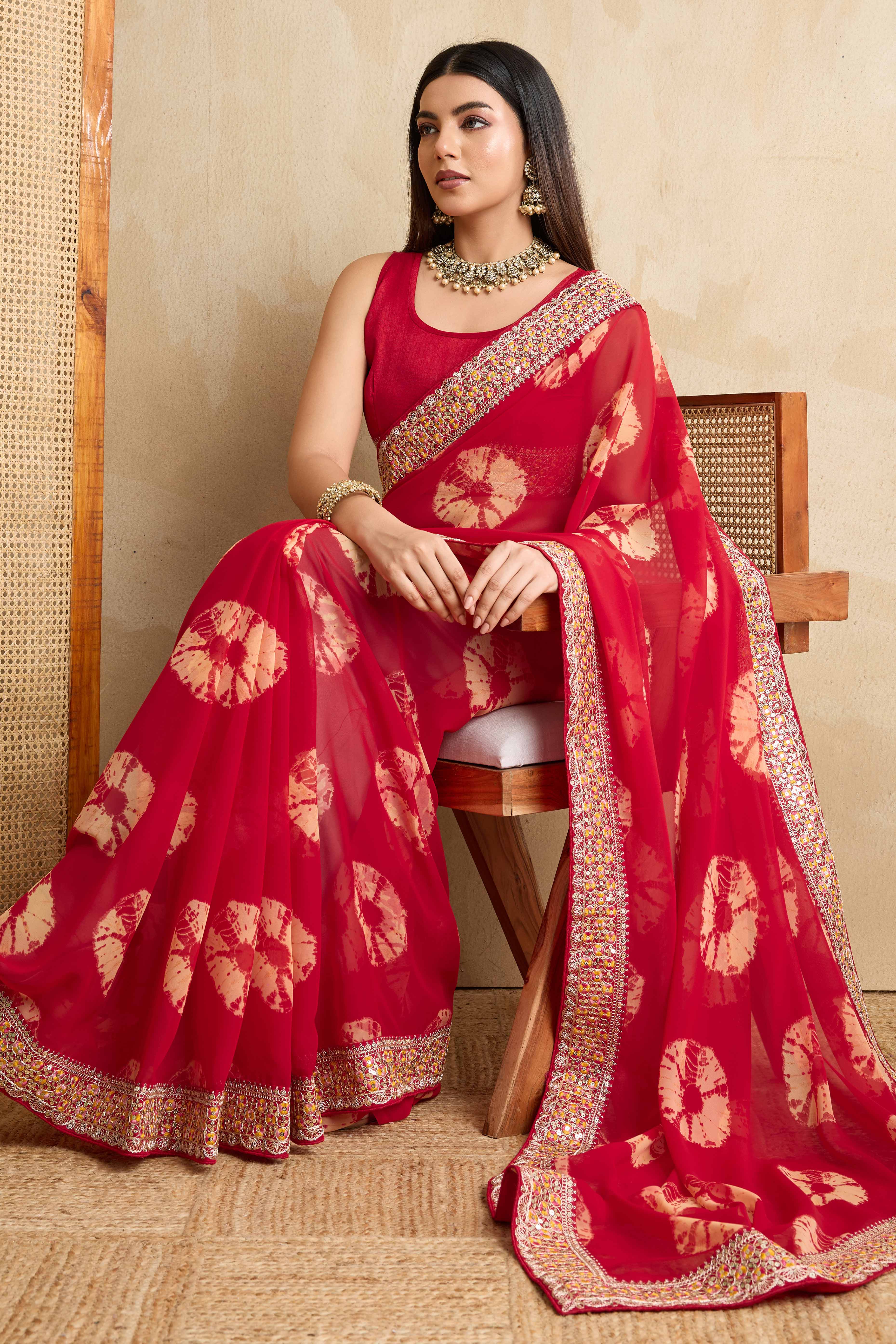 Red Georgette Saree with Contemporary Tie-Dye Patterns and Classic Lace Work Finish