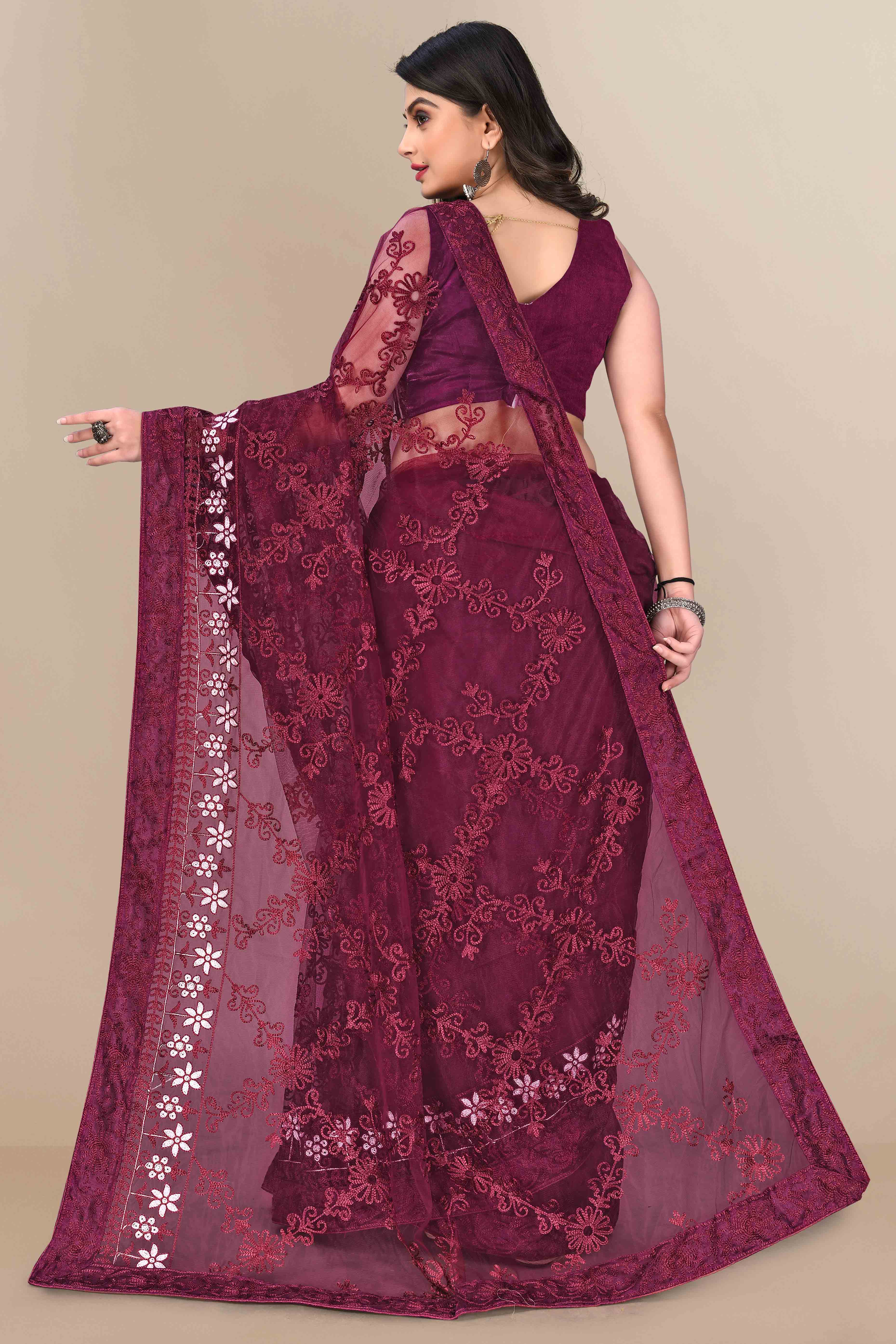 Wine Party Wear Net Saree Featuring Rich Floral Embroidery