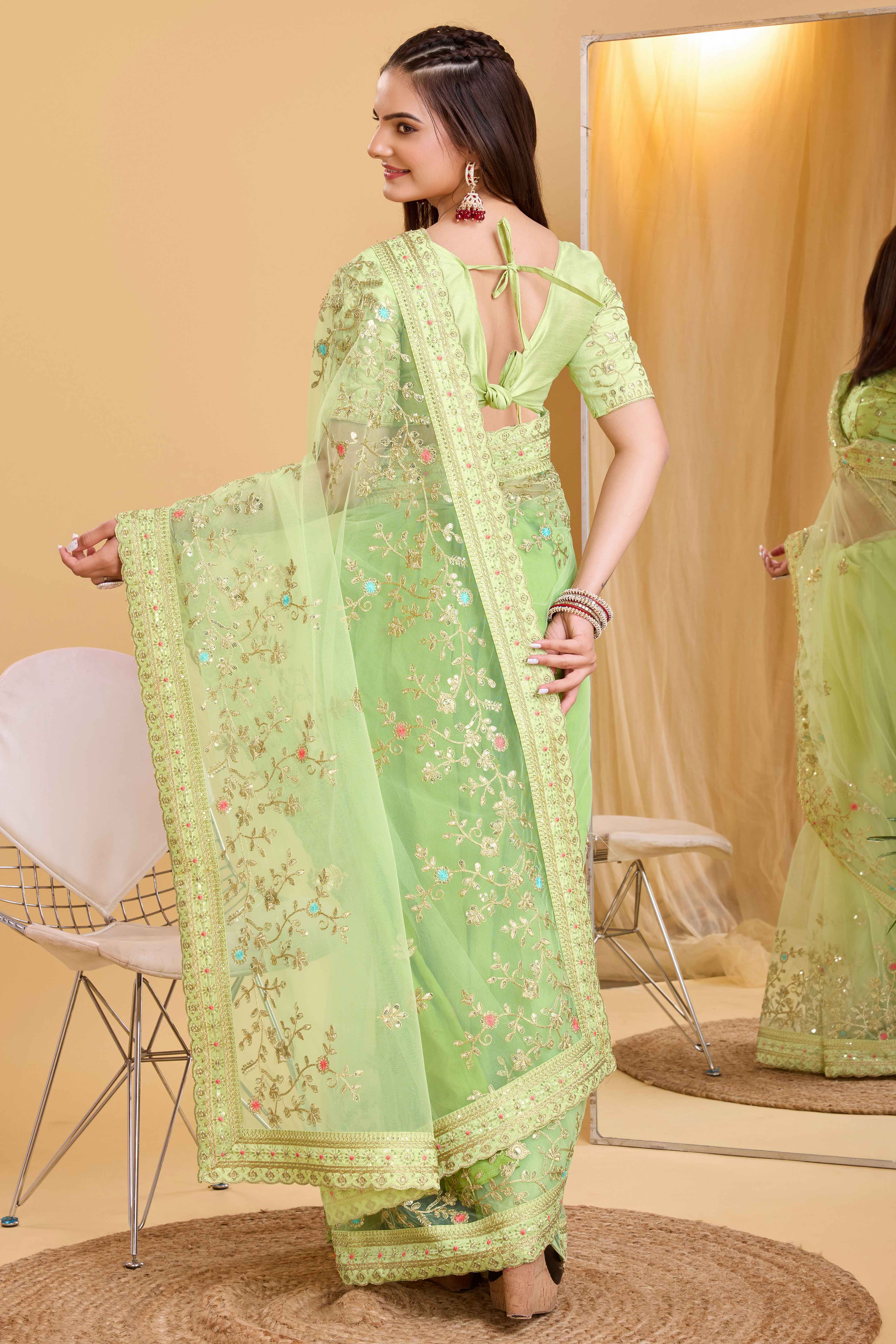 Green Soft Net Saree With Delicate Floral Embroidery & Shimmering Sequins Work