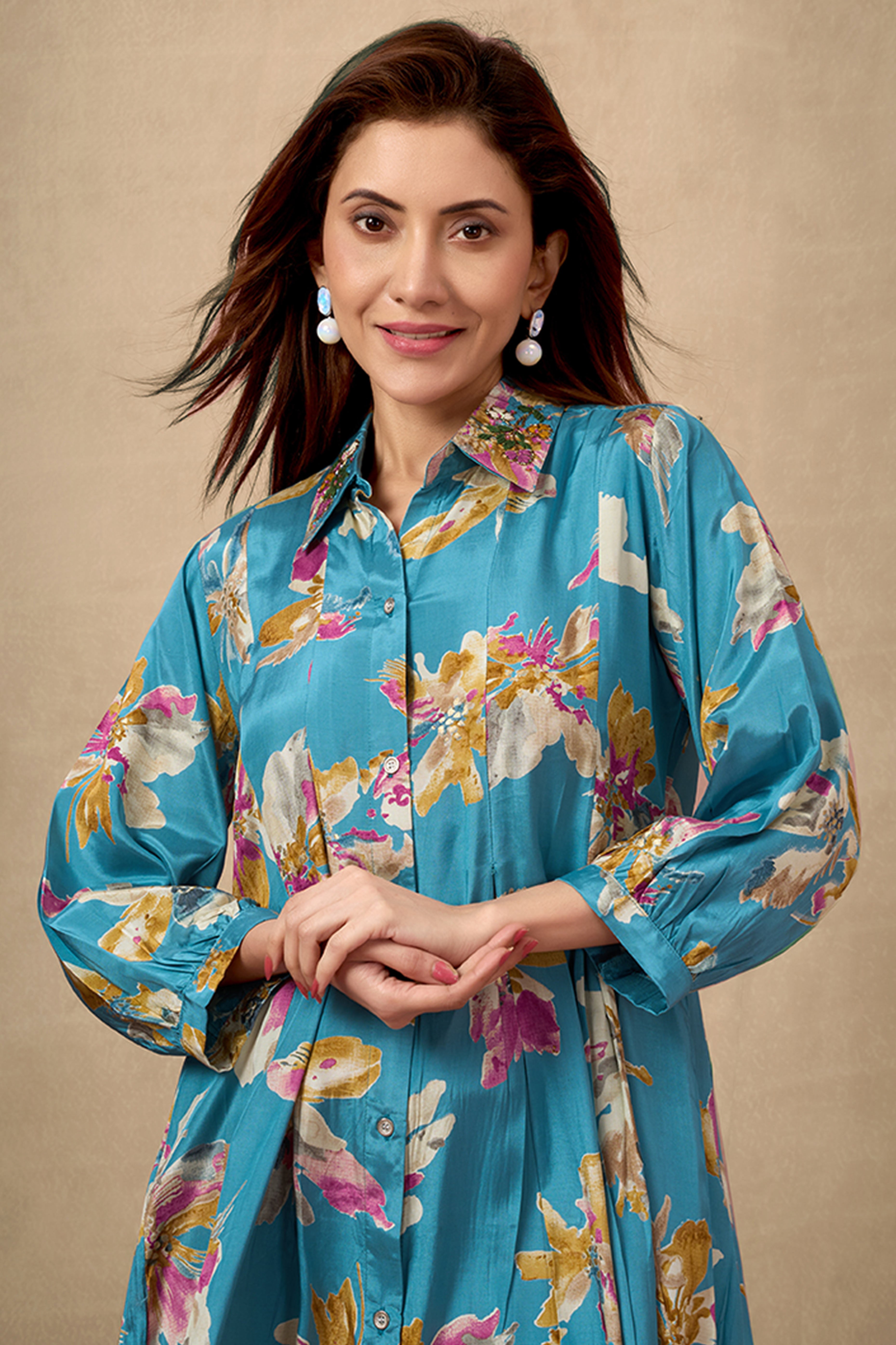 Turquoise Floral Printed Muslin Dress with a Flattering A-Line Silhouette