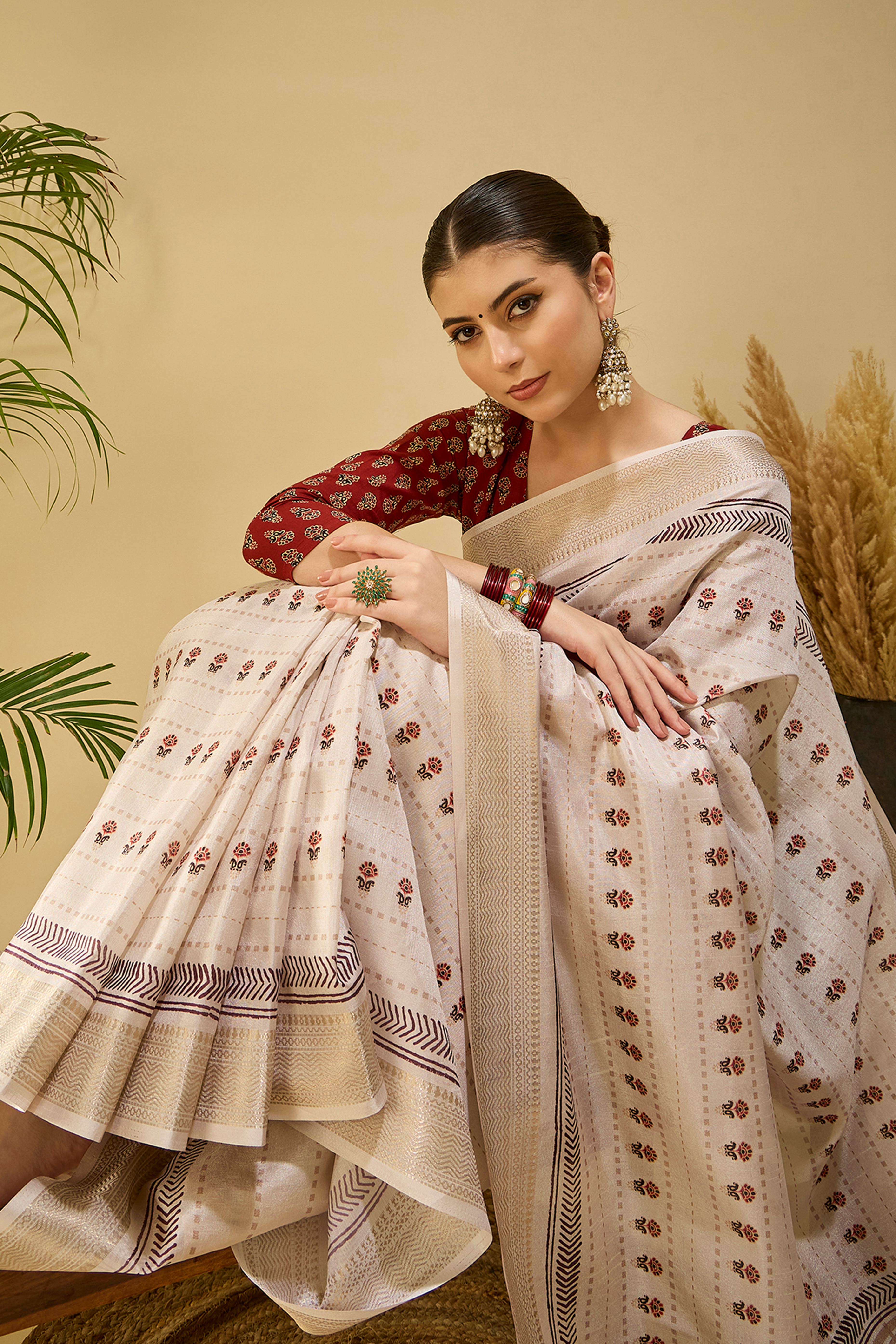 Timeless Cream Katki Cotton Silk Saree With Blooming Floral Prints & Tassel Draped Pallu