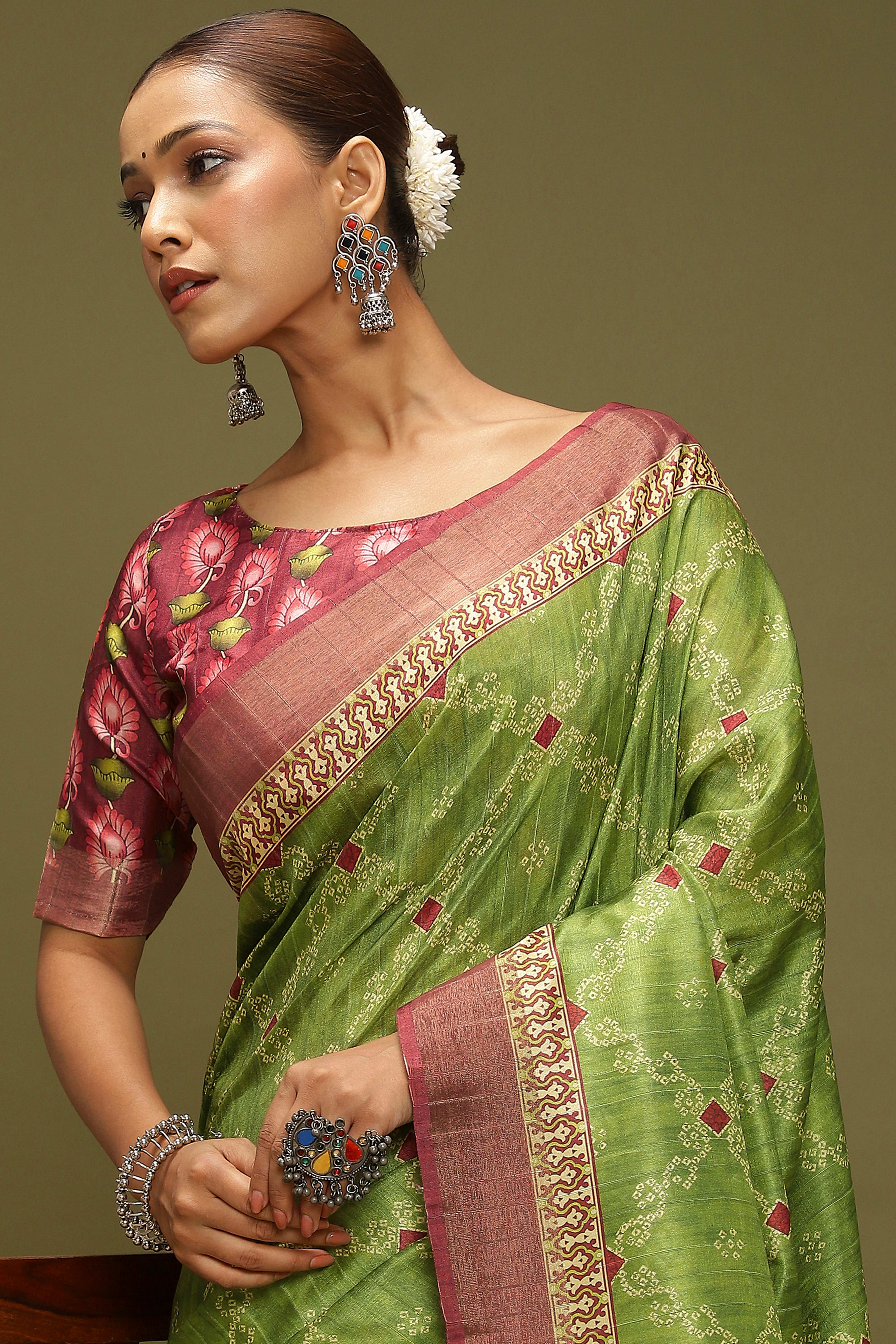 Green Silk Blend Saree Decorated with Vibrant Bandhani Prints and Festive Detailing
