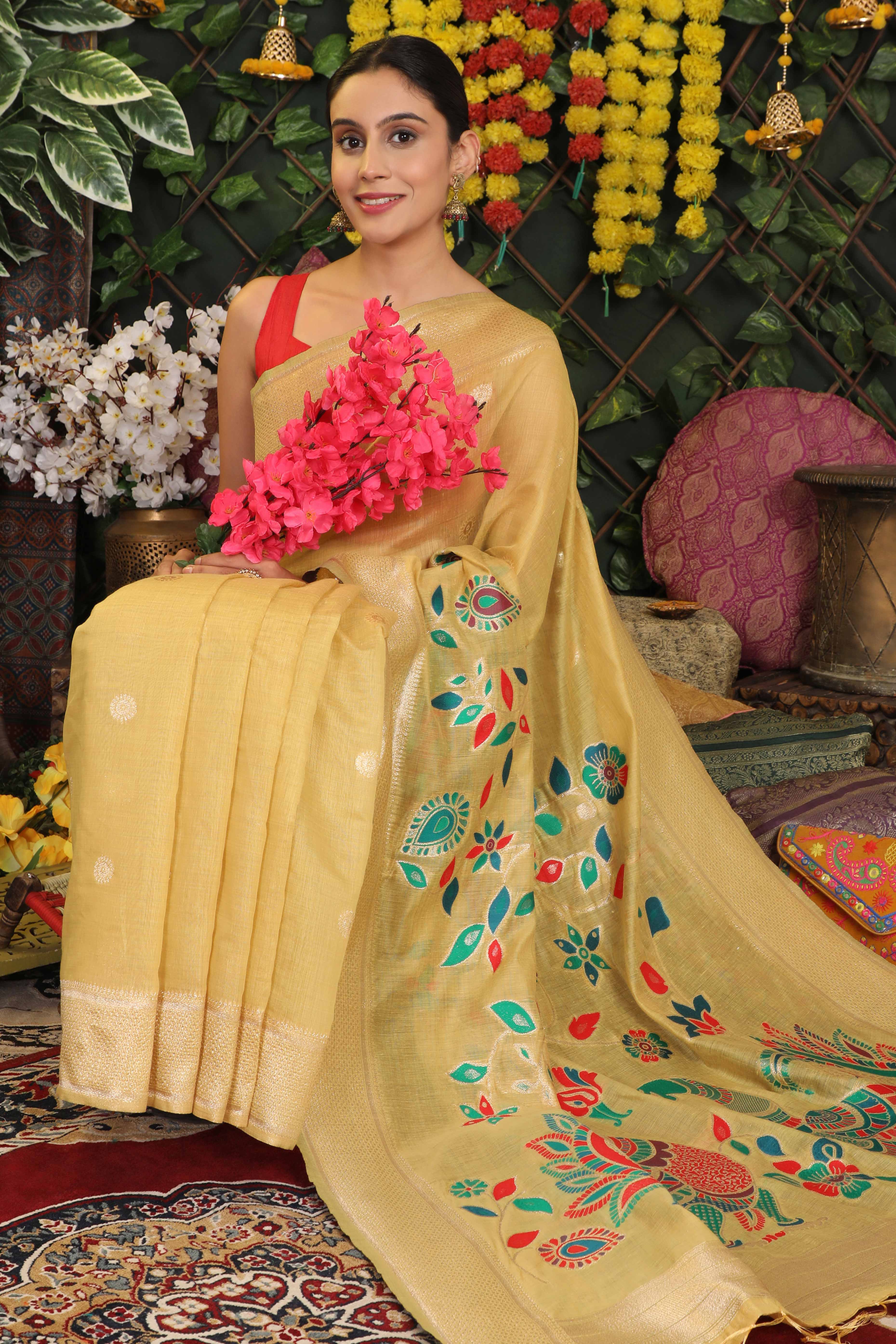 Light Yellow Linen Cotton Saree Showcasing Floral & Peacock Zari Woven Design