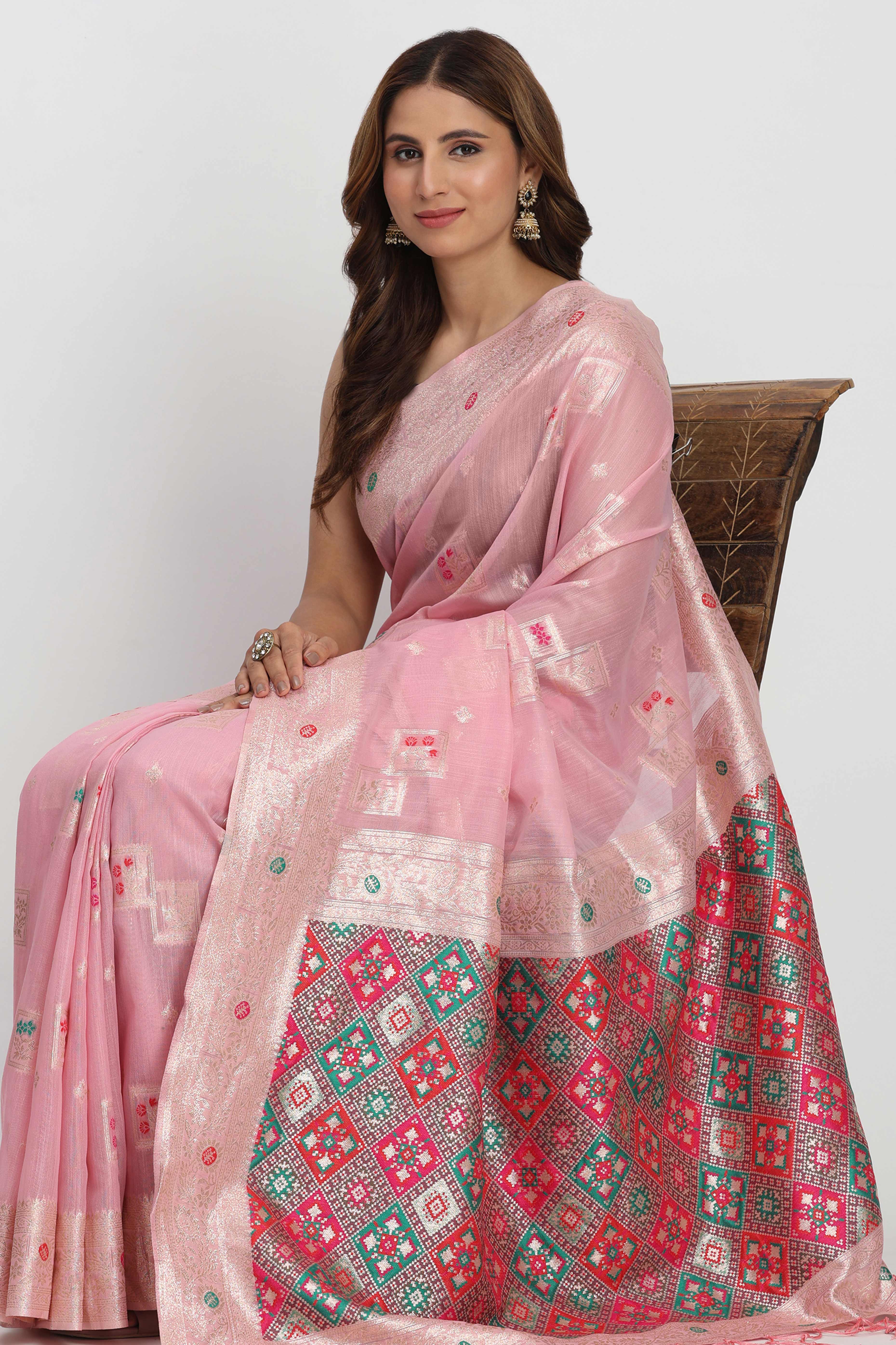 Floral Zari Weaving Brings Regal Beauty To This Light Pink Linen Cotton Saree With Tassel Accents