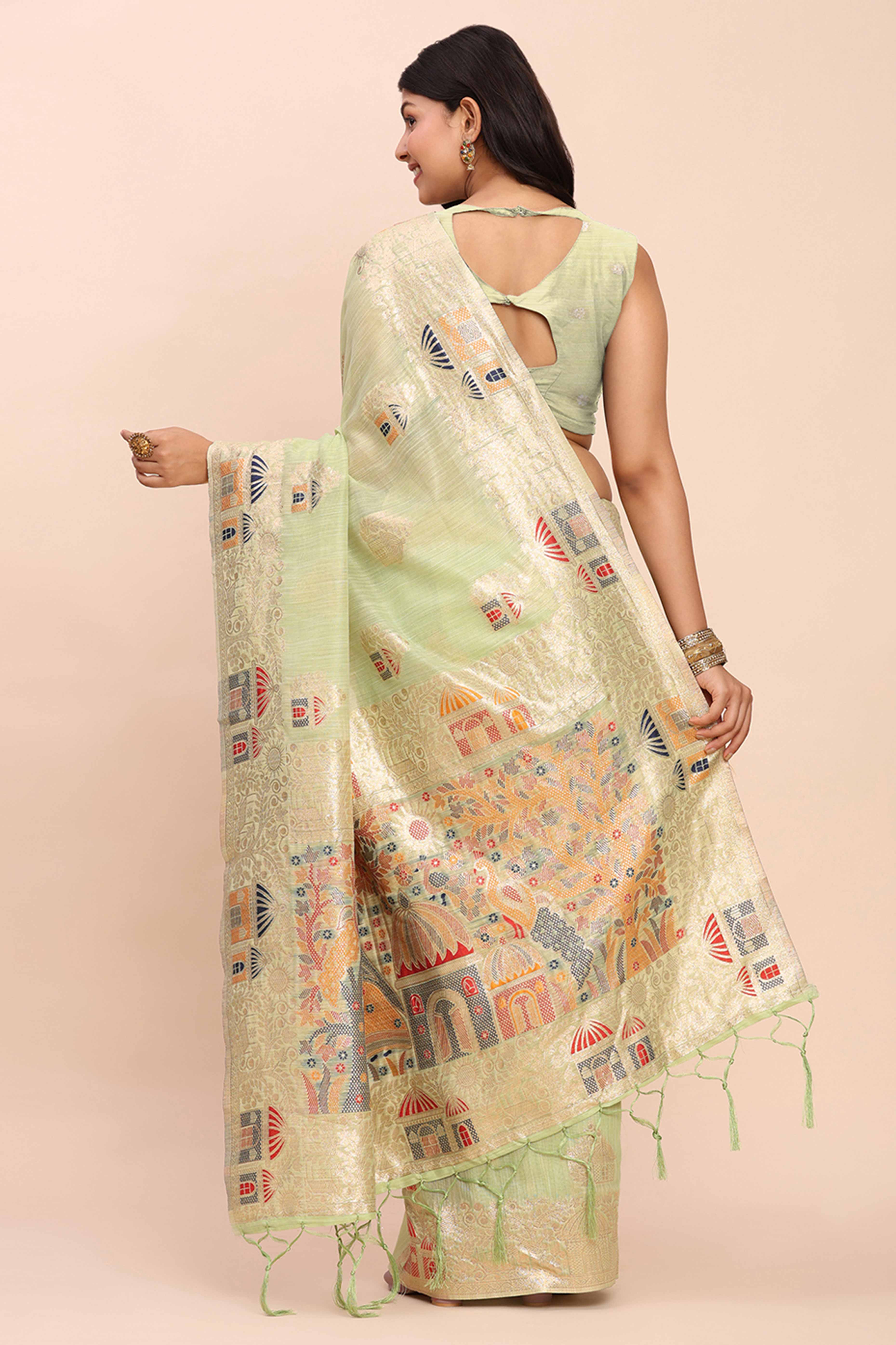 Light Green Bloom Zari Woven Linen Cotton Saree Adorned With Floral Motifs & A Tassel Finish