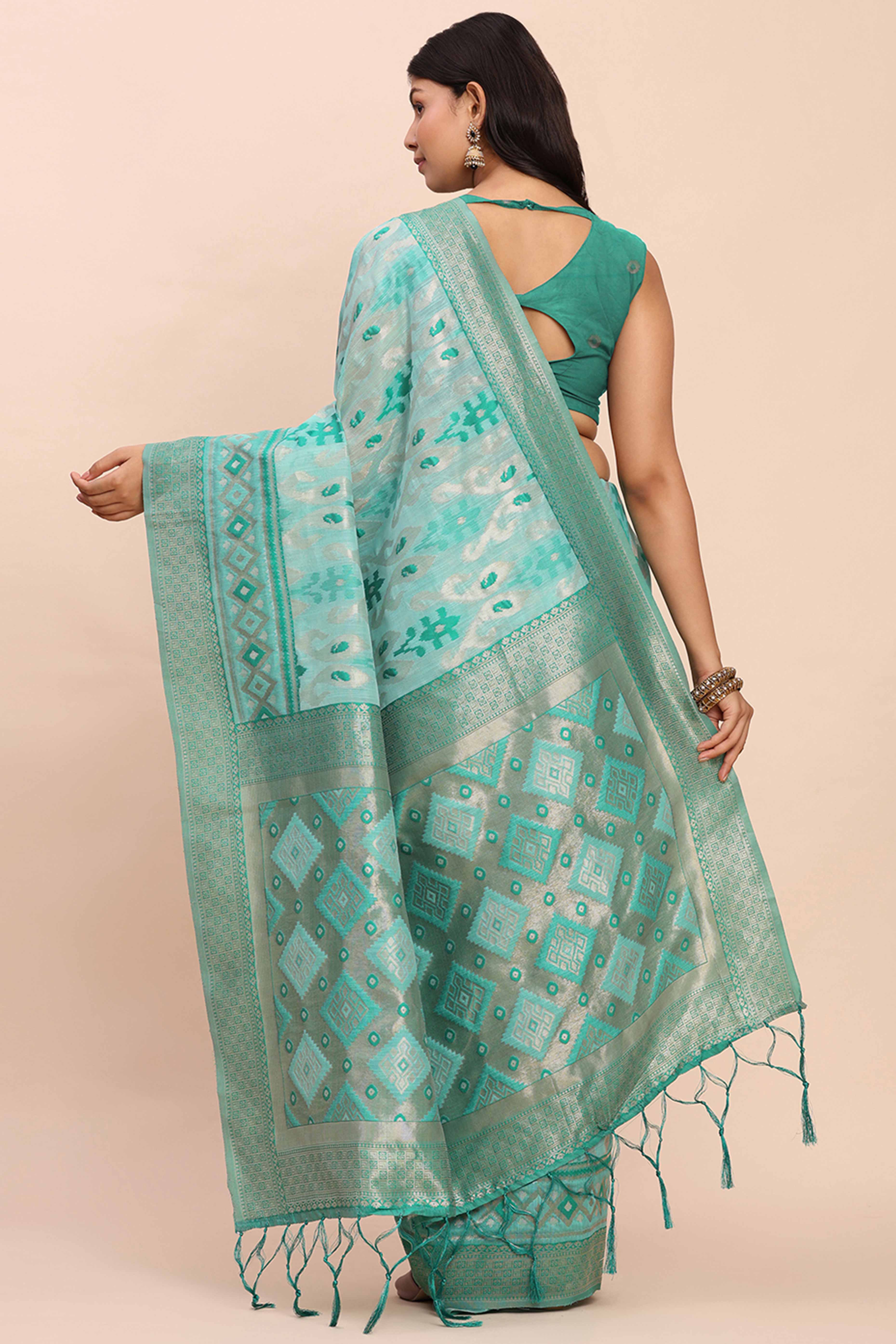 Turquoise Patola Inspired Linen Cotton Saree Adorned With Zari Weaving & Graceful Tassel Pallu