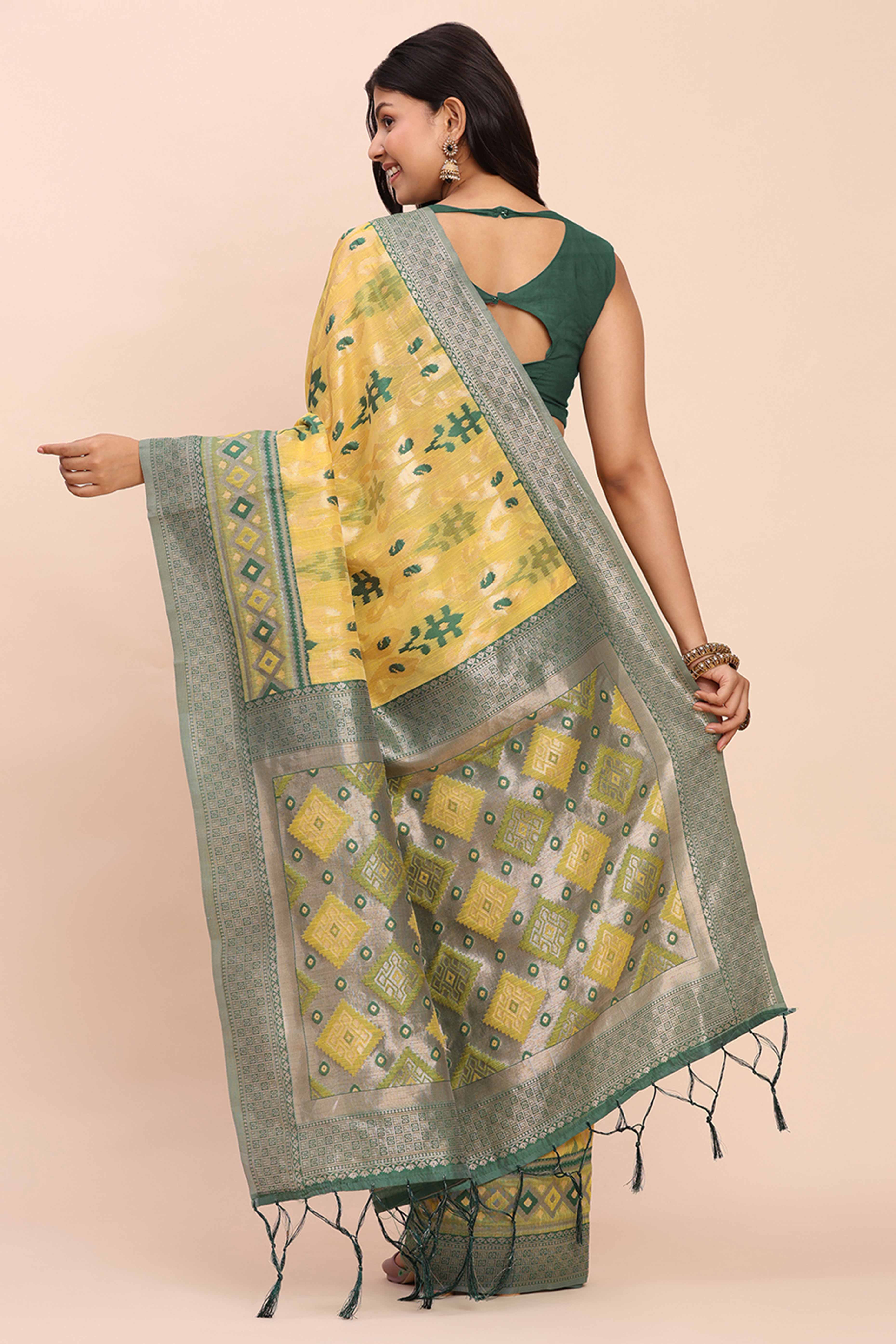 Yellow Patola Inspired Linen Cotton Saree Adorned With Zari Weaving & Graceful Tassel Pallu