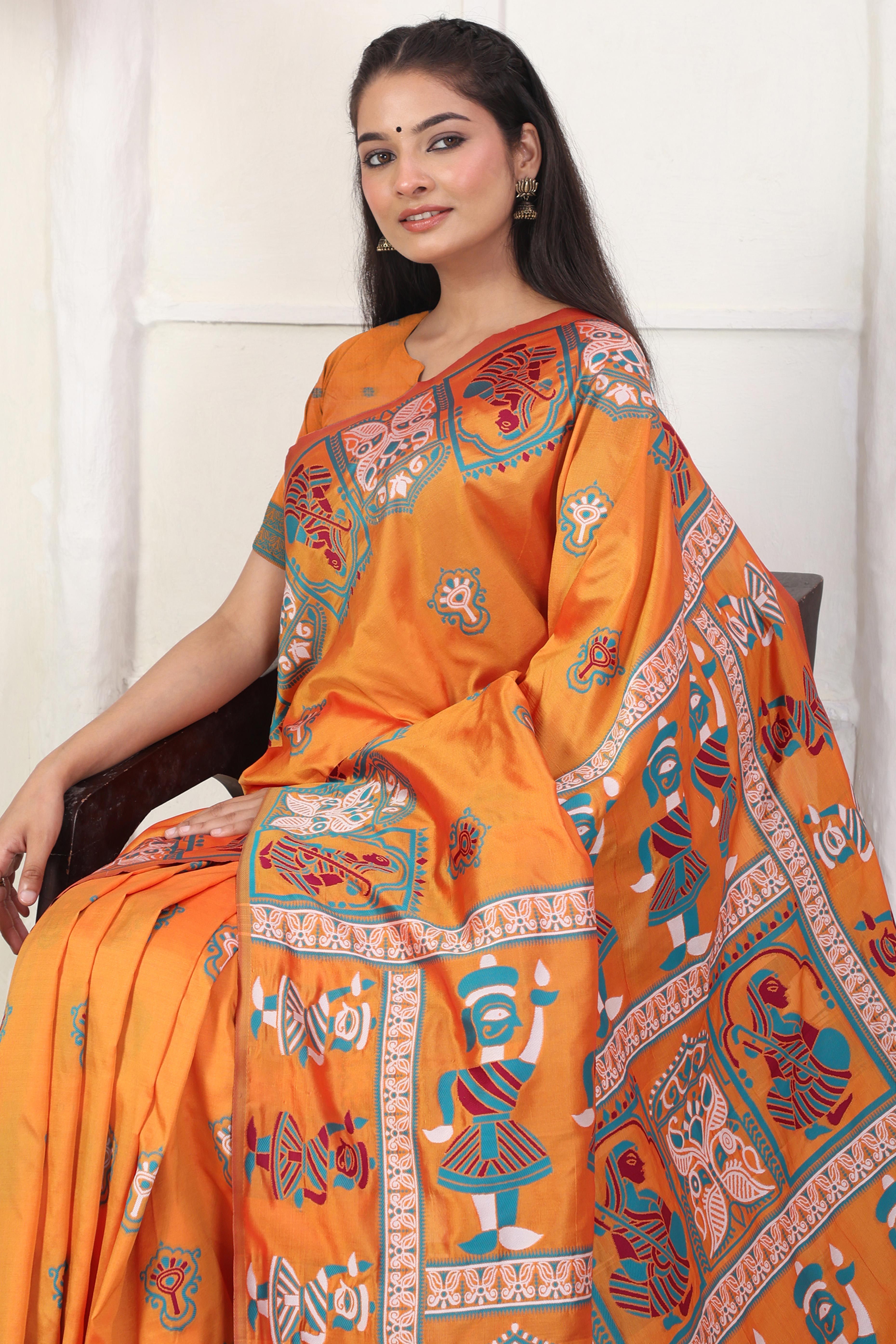 Orange Ethnic Madhubani Print Silk Blend Saree Enhanced With Tassel Pallu Accents