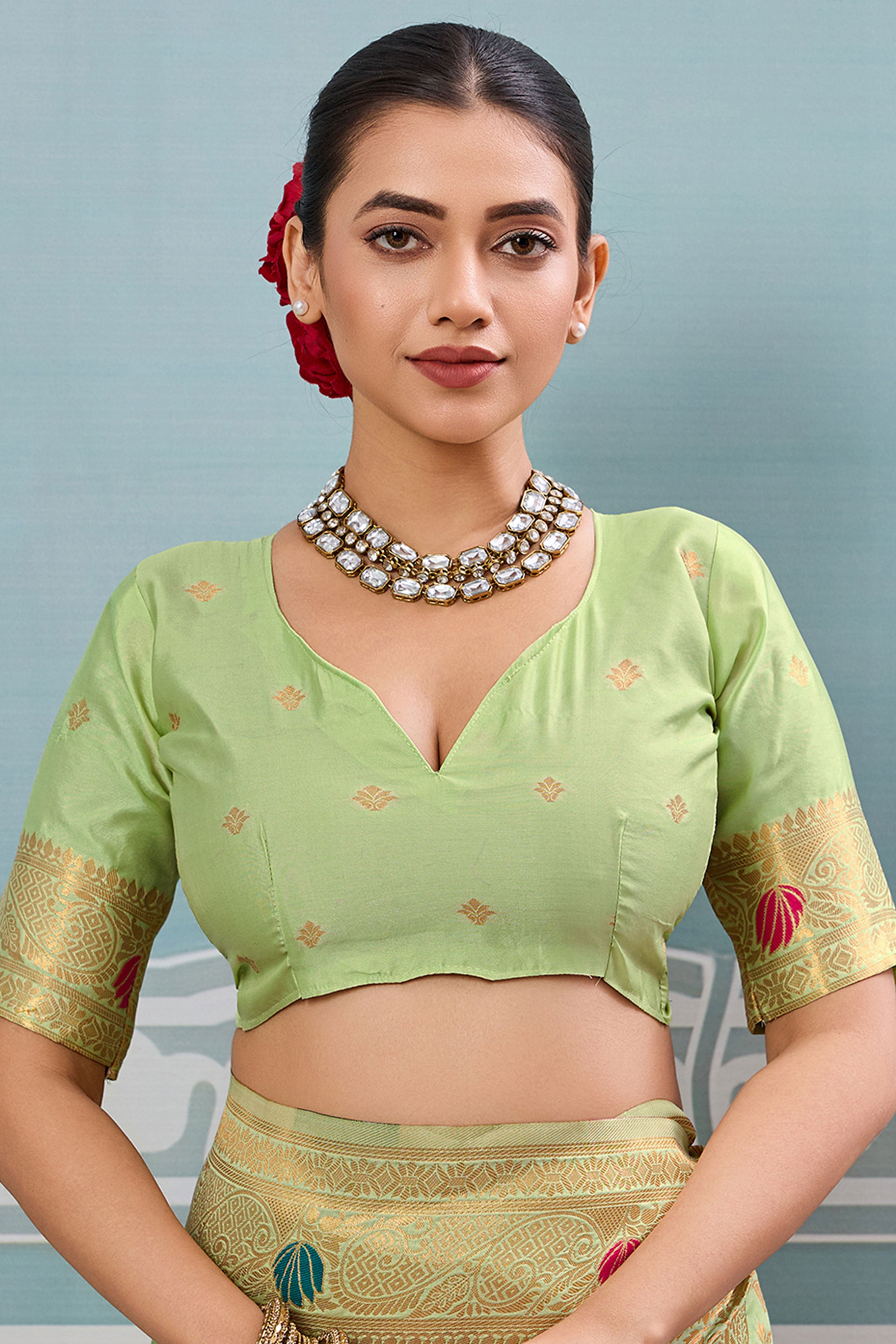 Radiant Pista Green Silk Blend Saree Adorned With Intricate Floral Zari Weaving & Tassel Pallu