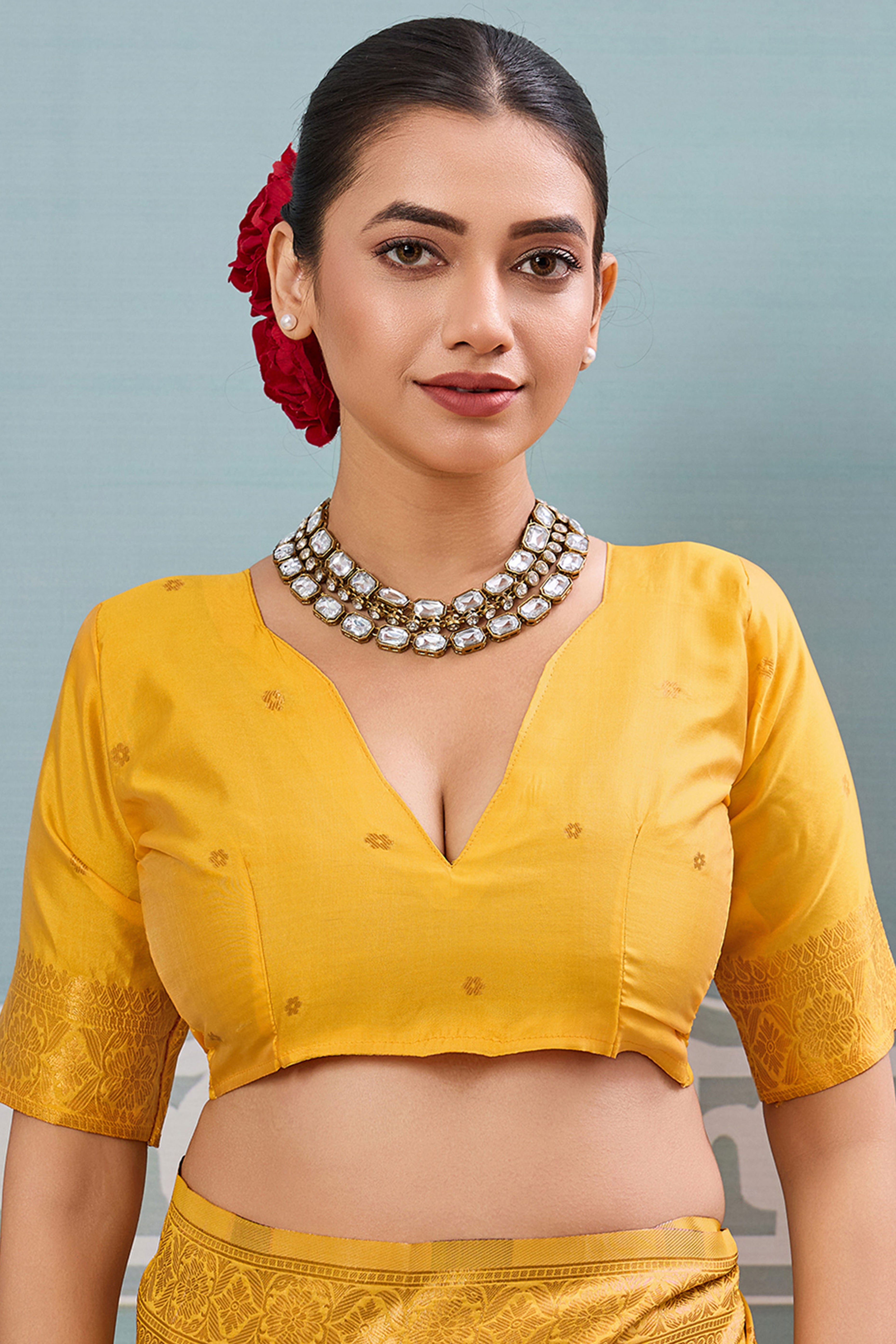 Majestic Bloom Yellow Floral Zari Weaving Silk Blend Saree With Elegant Tassel Pallu