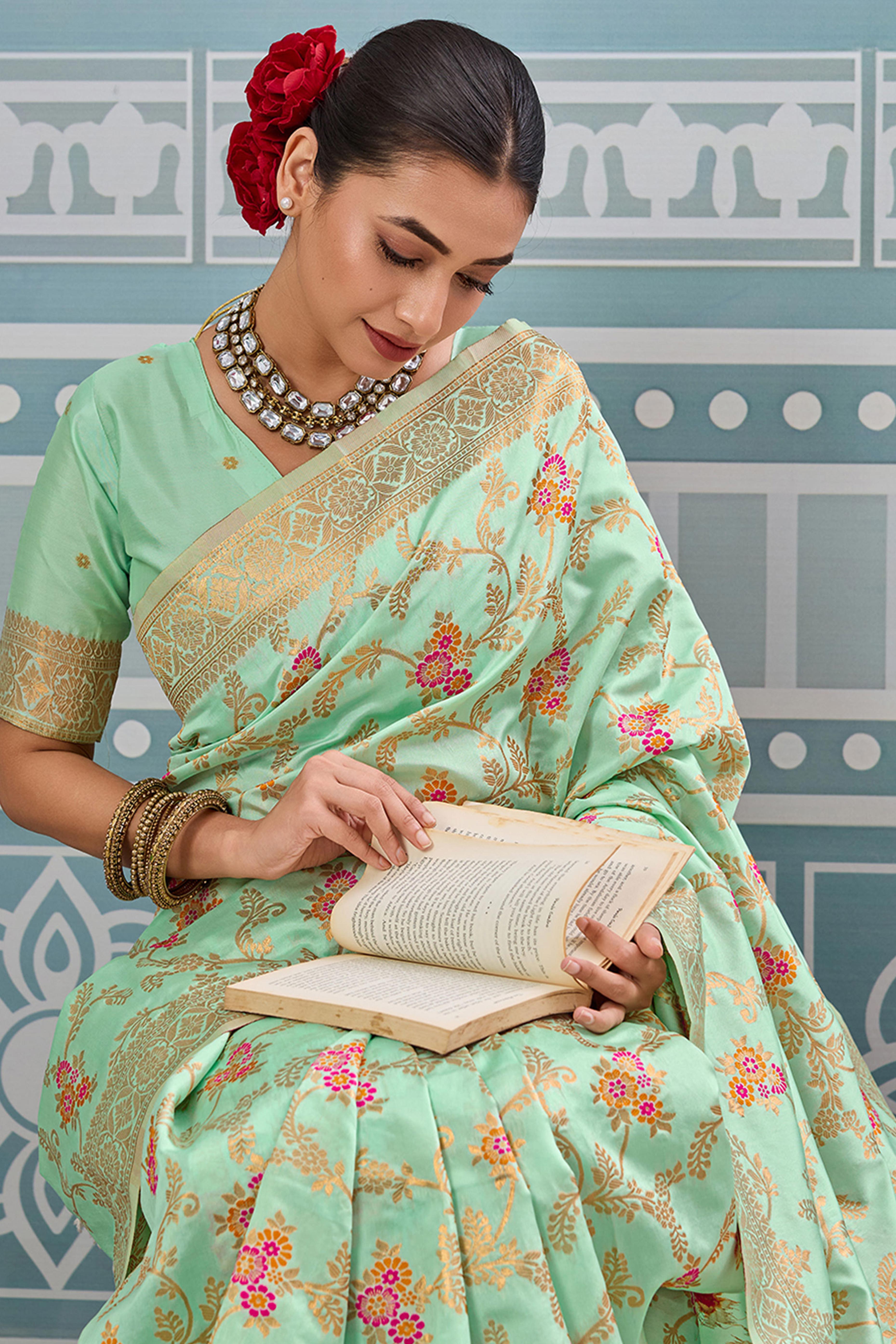 Majestic Bloom Sea Green Floral Zari Weaving Silk Blend Saree With Elegant Tassel Pallu