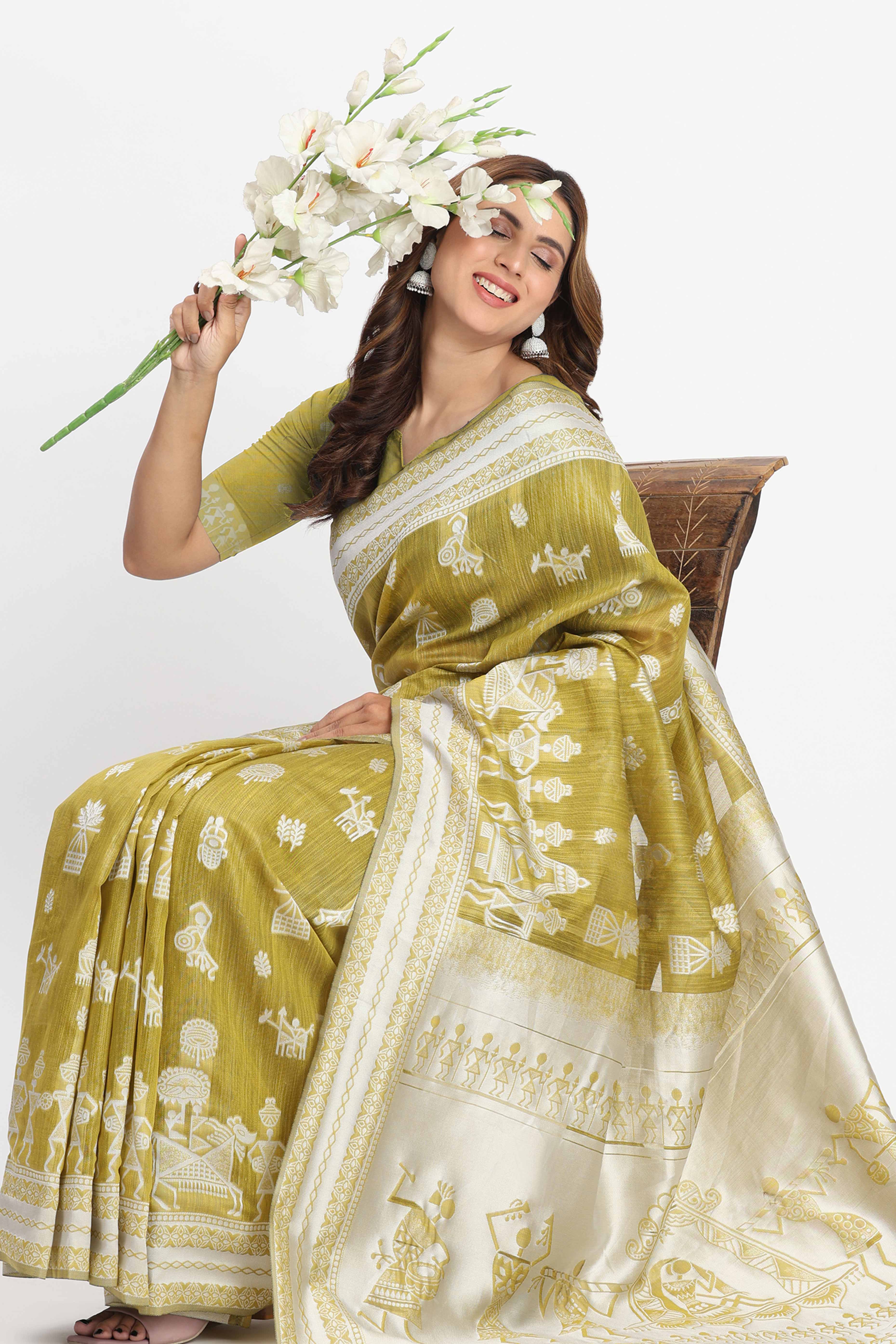 Green Linen Cotton Saree Showcasing Traditional Warli Motifs In Zari Weaving With Tassel Pallu