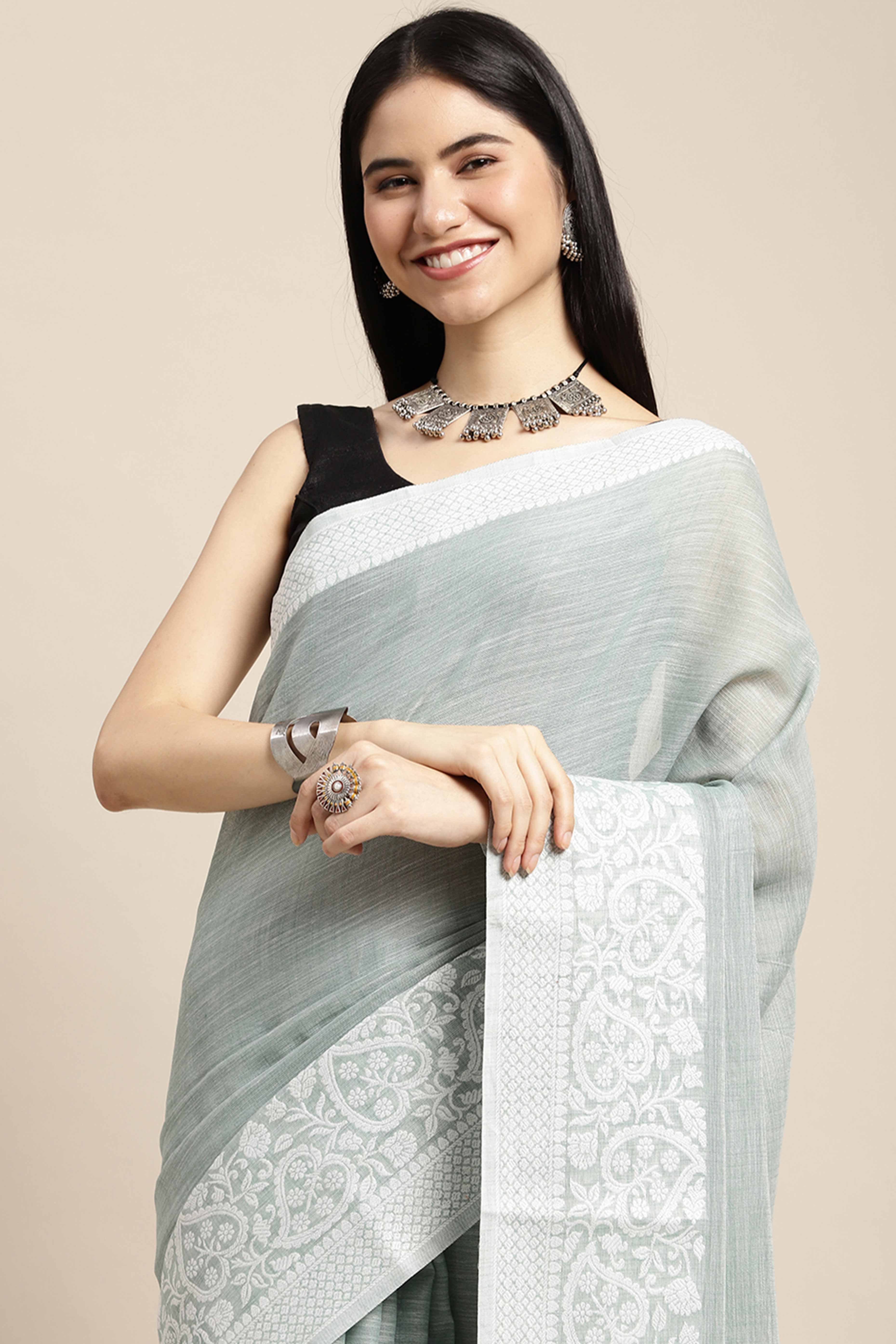 Sea Green Festive Linen Weaving Saree with Silver Zari Border & Pallu