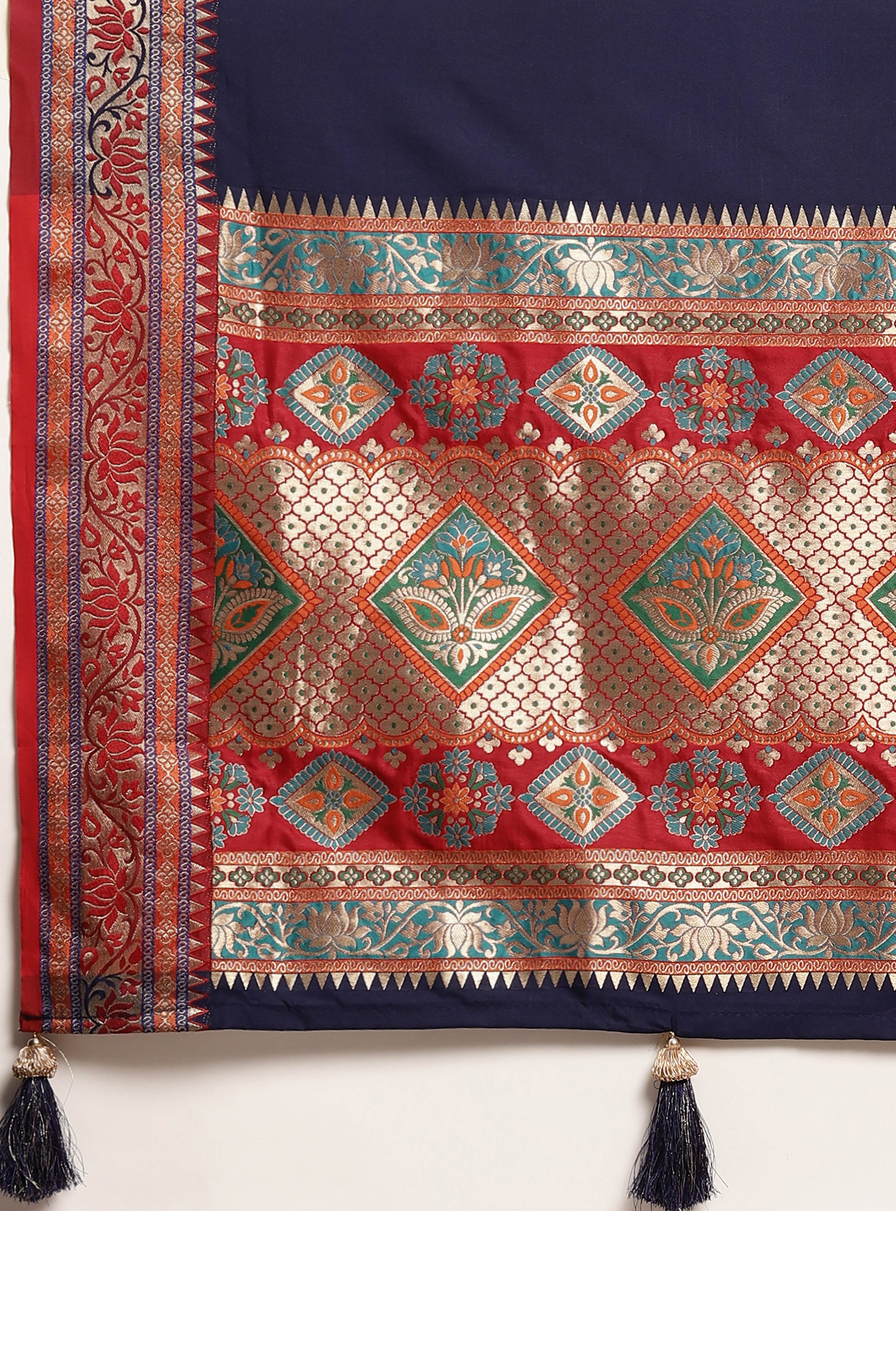 Graceful Navy Blue Solid Saree Highlighted With Floral Zari Weaving On Silk Blend & Tassel Pallu