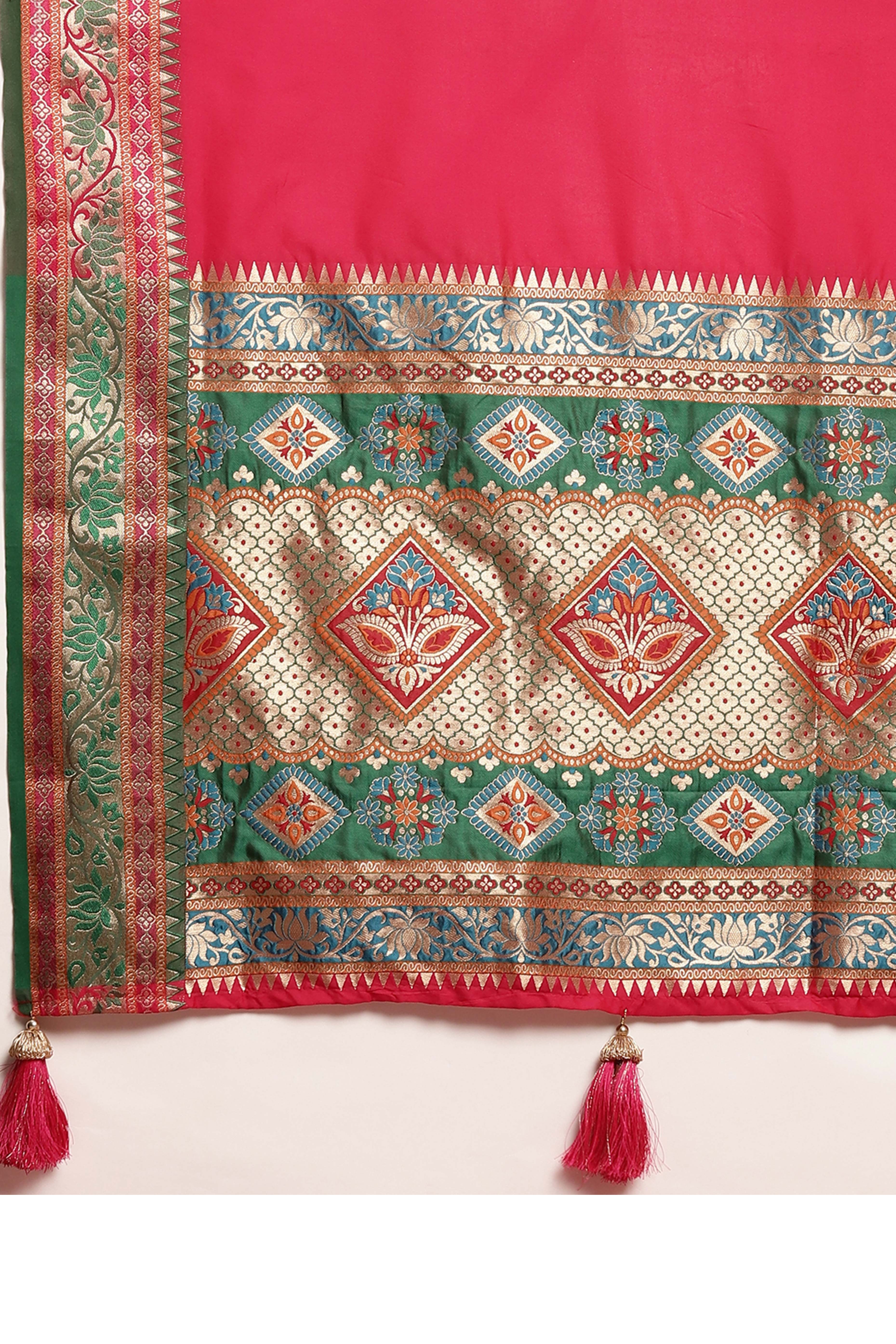 Graceful Pink Solid Saree Highlighted With Floral Zari Weaving On Silk Blend & Tassel Pallu