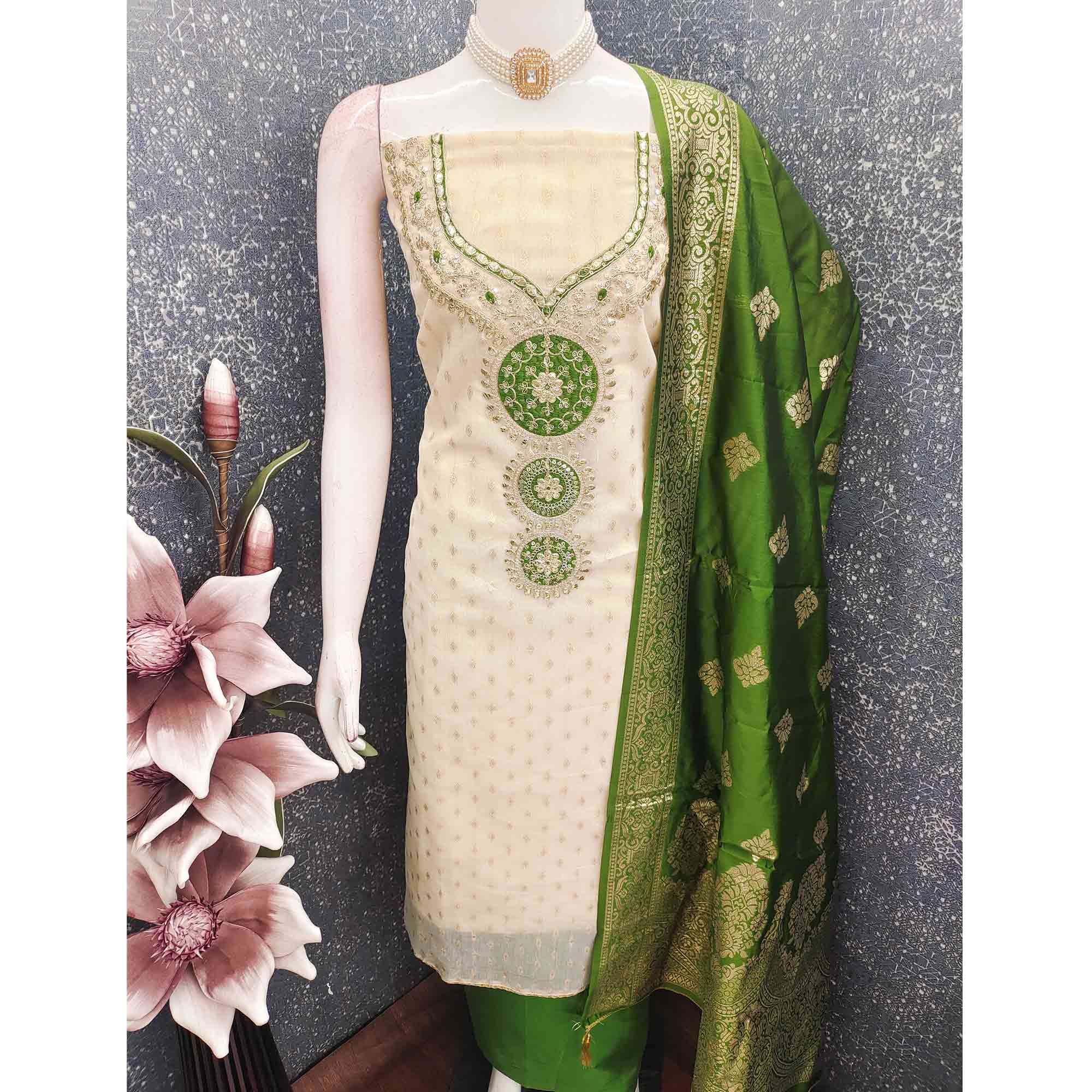 Cream & Green Shimmer Dress Material Featuring Intricate Zari Weaving With Cording Embroidery