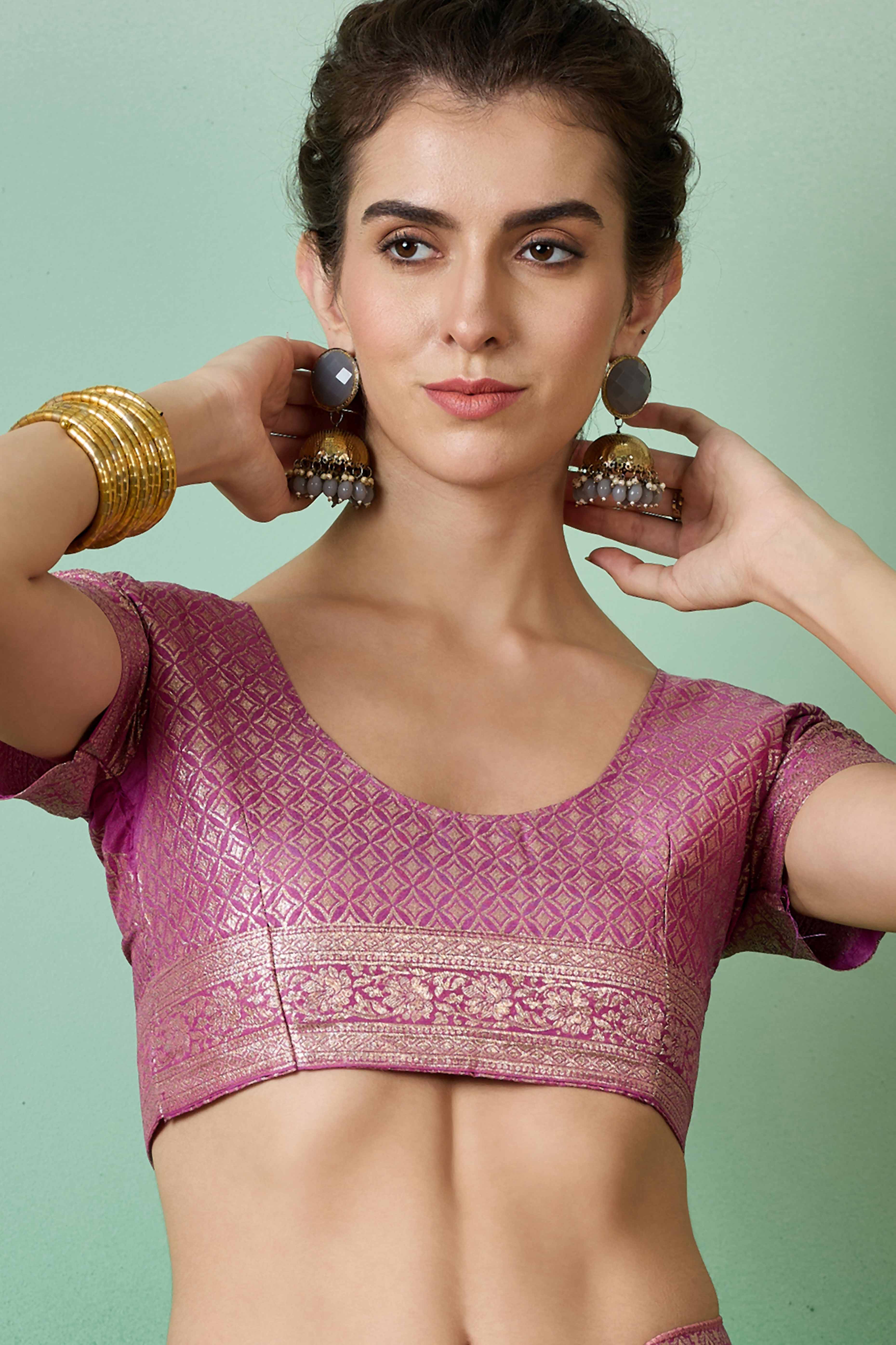 Magenta Cotton Blend Saree Adorned With Floral Zari Weaving & Soft Tassel Accents