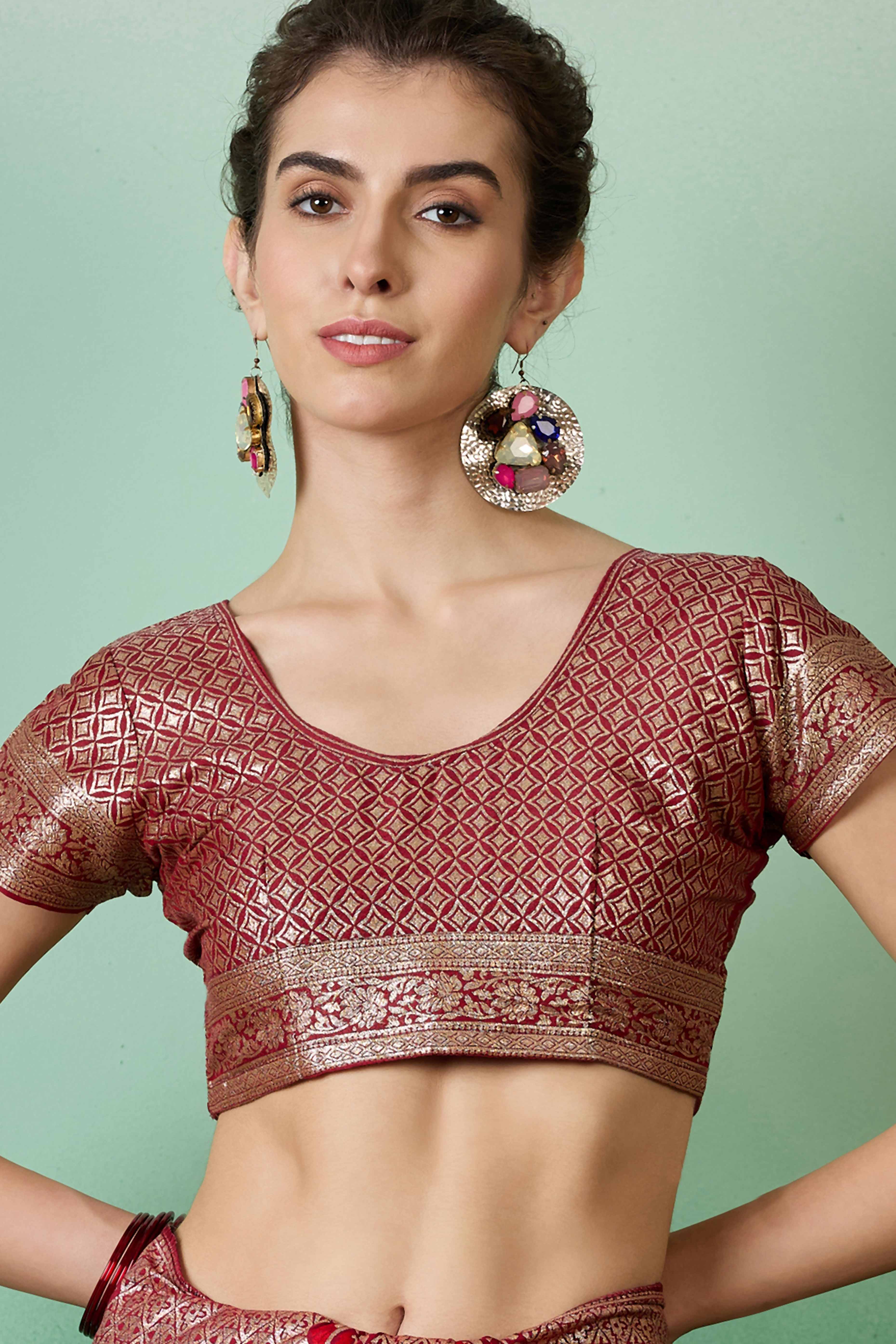 Maroon Cotton Blend Saree Adorned With Floral Zari Weaving & Soft Tassel Accents