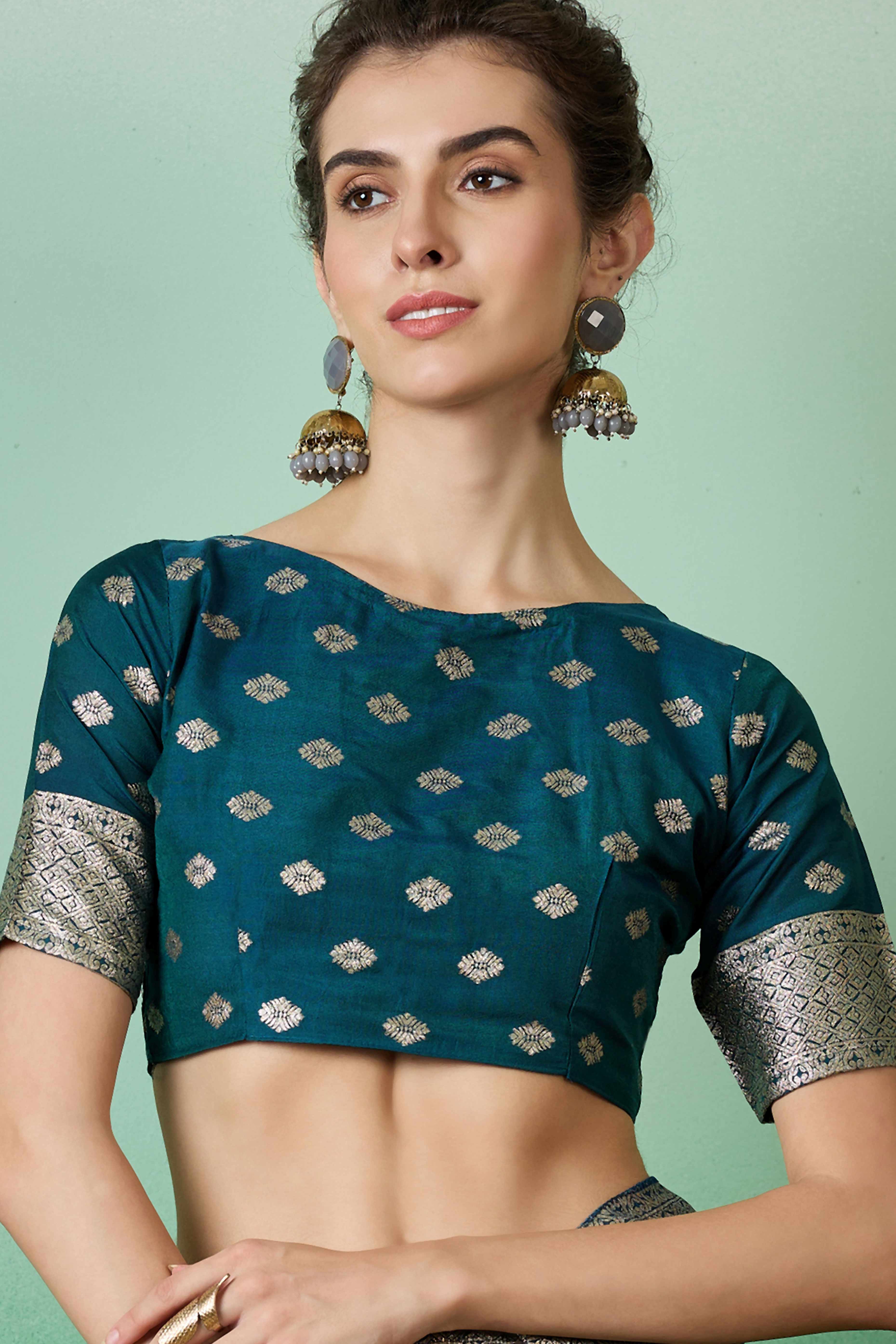 Teal Zari Woven Staple Cotton Blend Saree With Floral Motifs & Tassel Detailed Pallu
