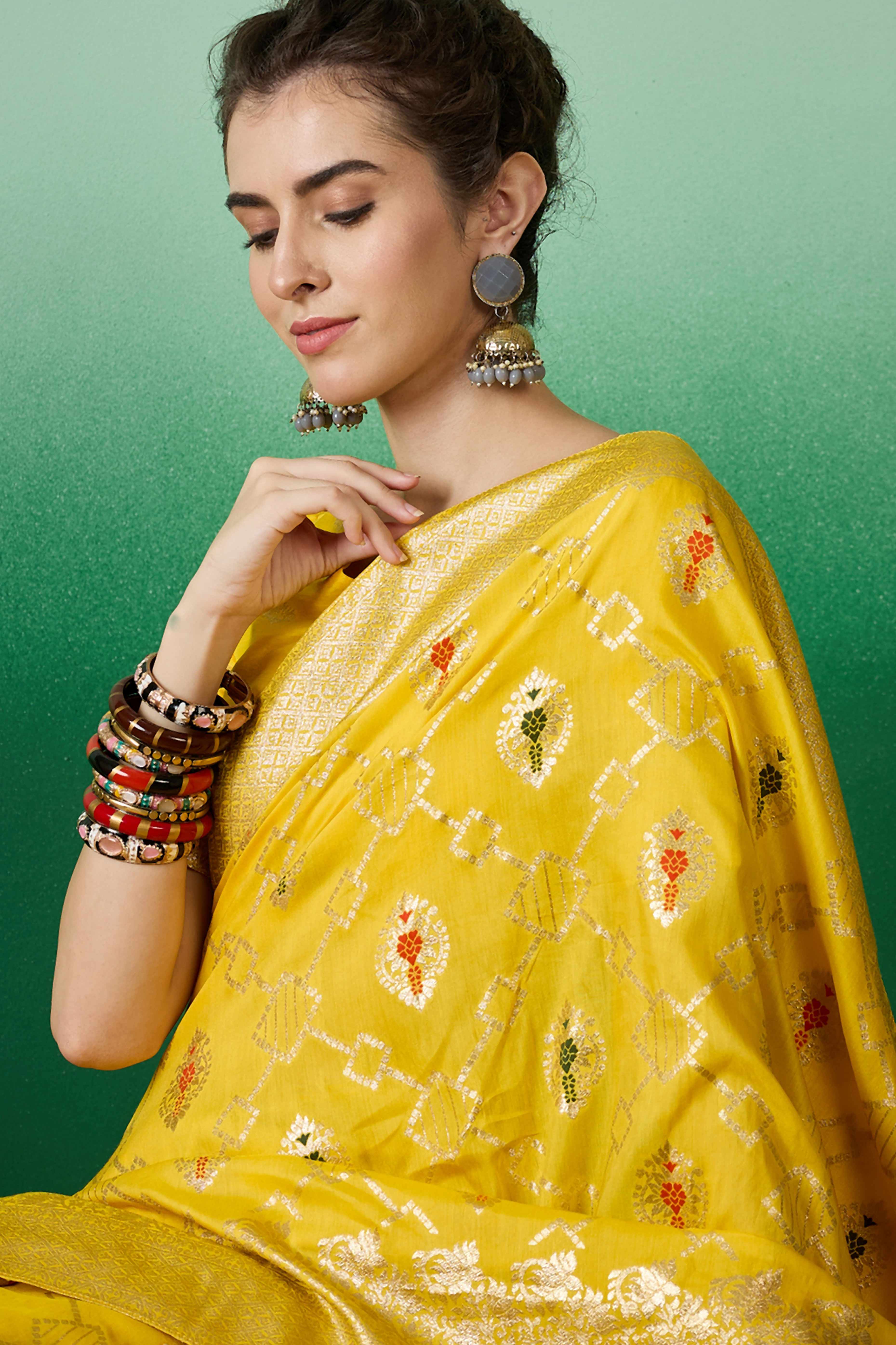 Yellow Zari Woven Staple Cotton Blend Saree With Floral Motifs & Tassel Detailed Pallu