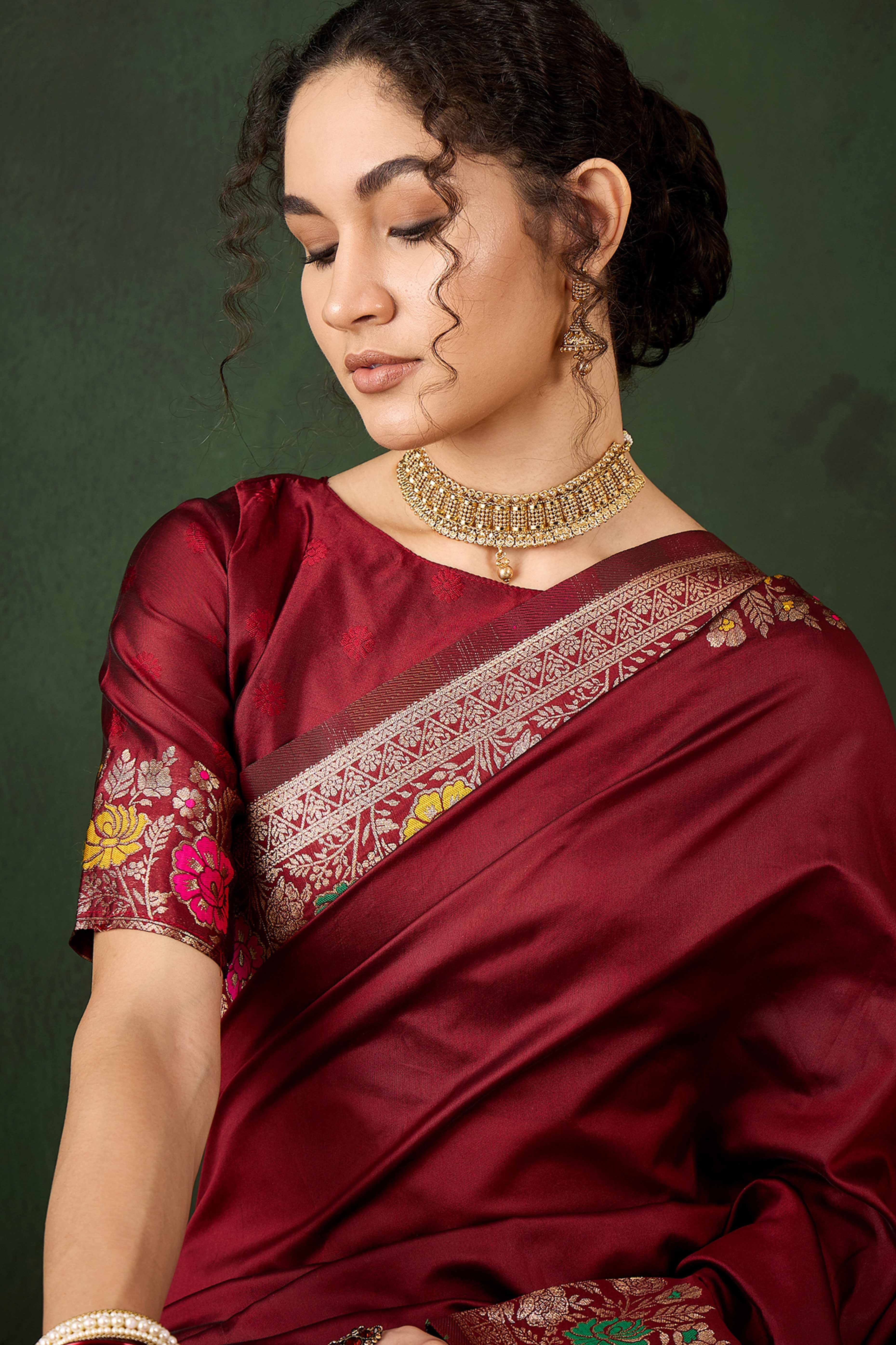 Maroon Saree In Poly Silk Blend Featuring Floral Zari Weaving & Tassel Accents