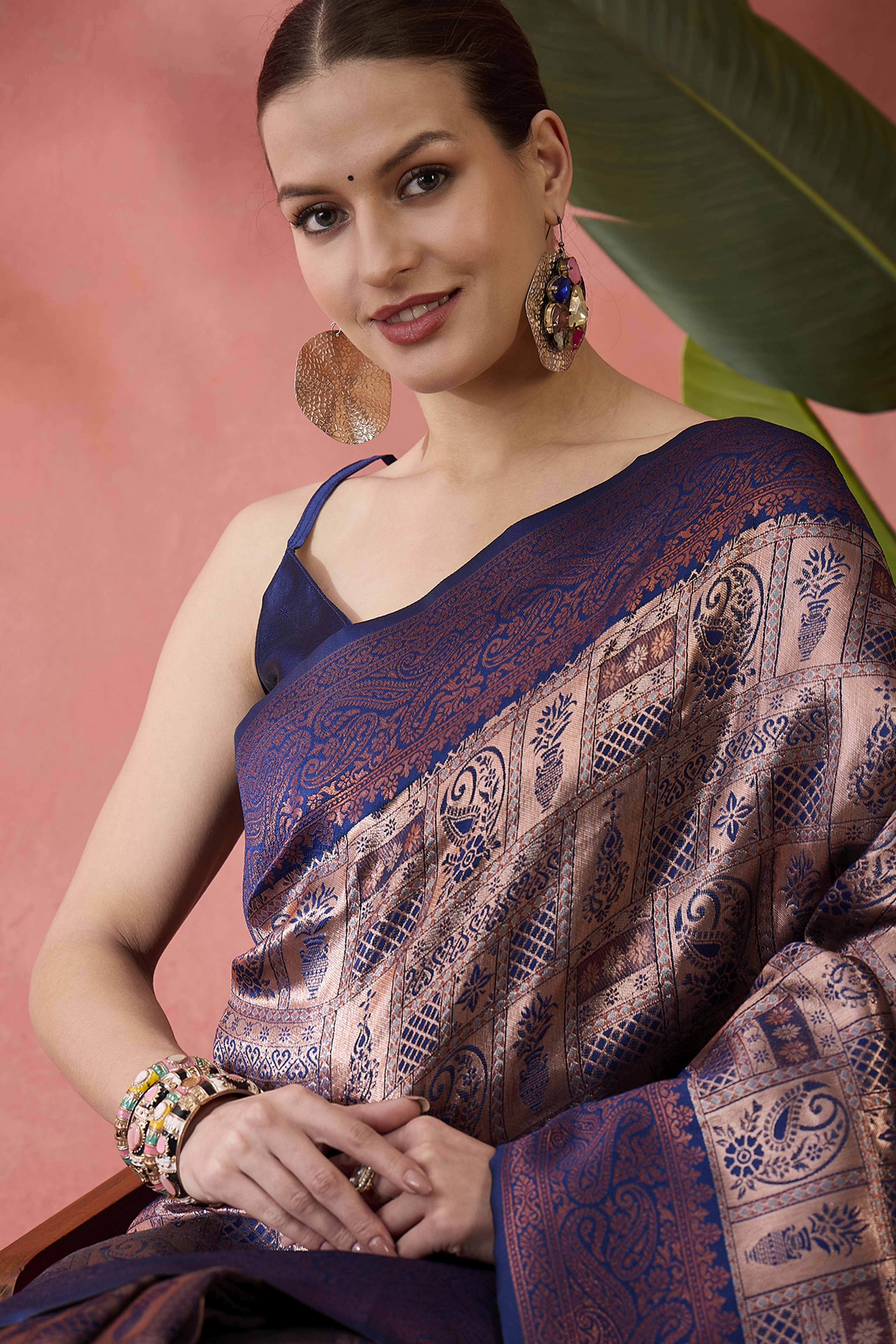 Navy Blue Woven Poly Silk Blend Saree Featuring Floral & Paisley Motifs With Tassel Accents