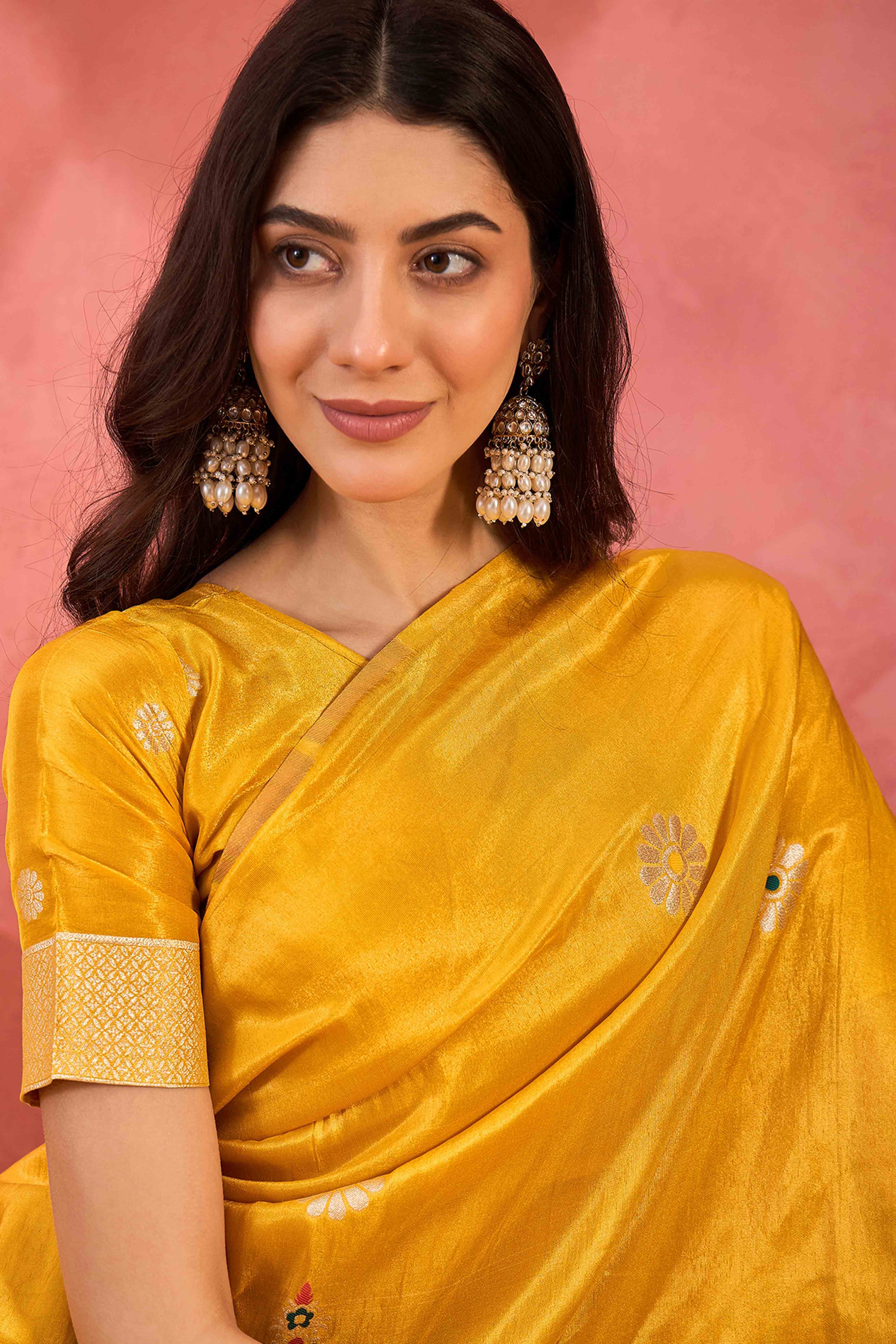Yellow Shimmer Saree Adorned with Floral Zari Weaving & Tassel Pallu