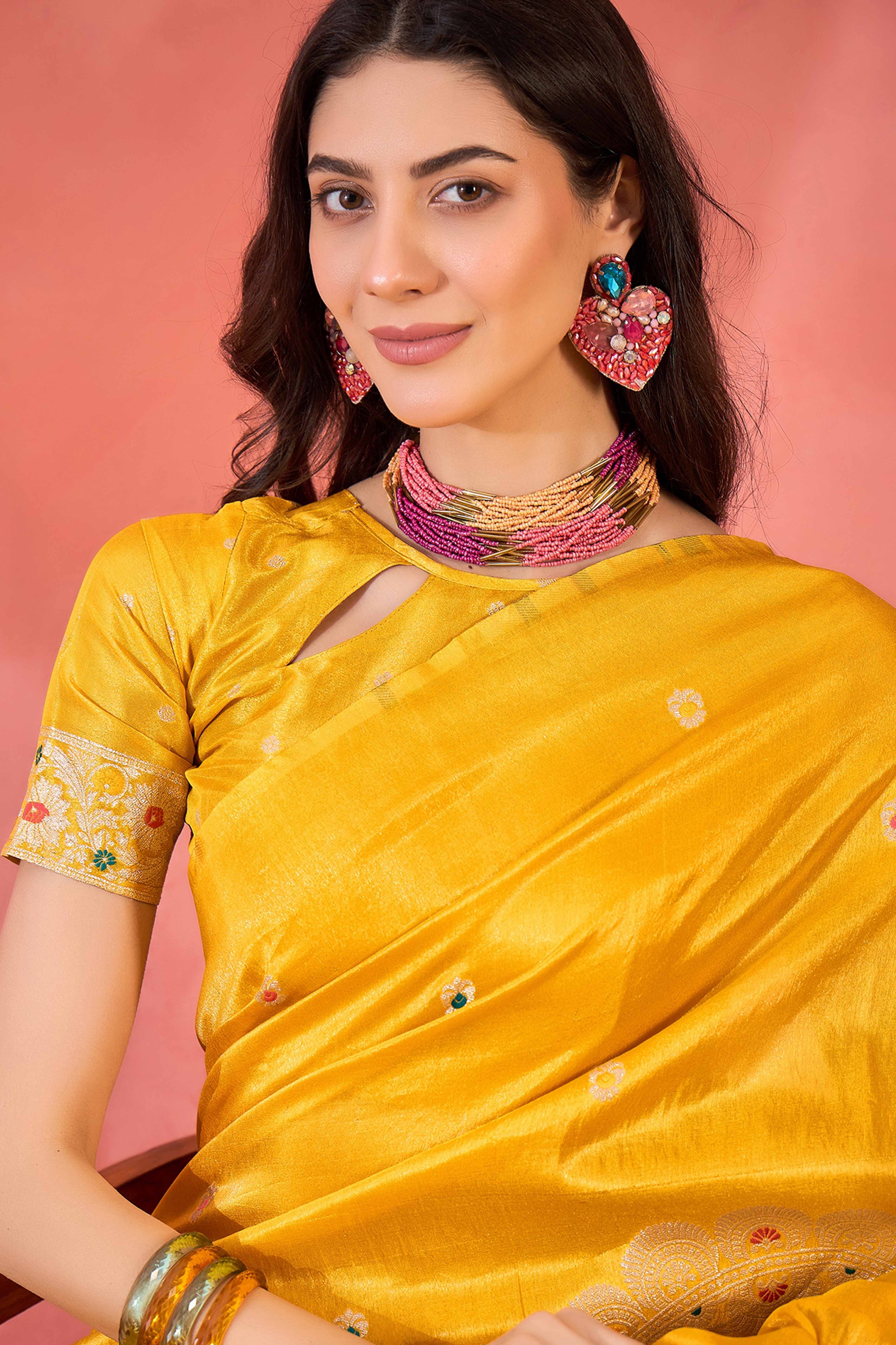 Yellow Zari Woven Shimmer Saree With Floral Motifs & Flowing Tassel Pallu