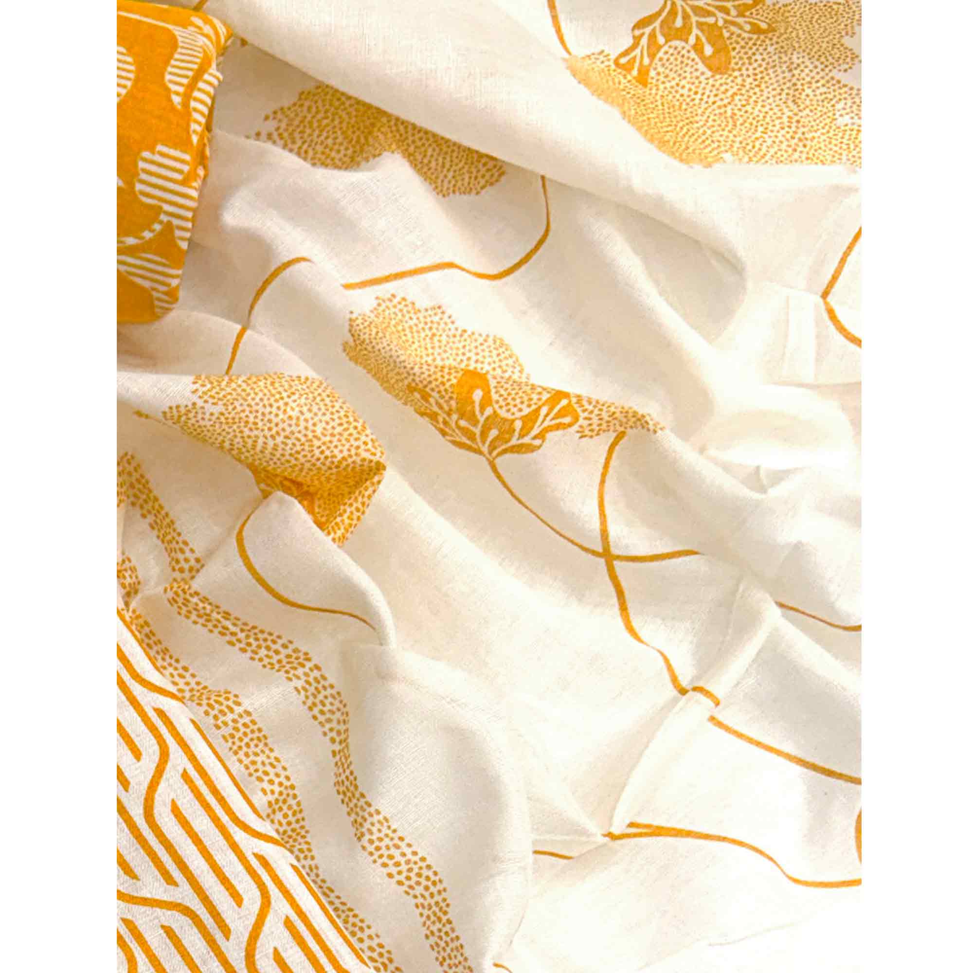 Trendy Mustard Geometric Print Pure Cotton Dress Material Featuring Stylish Tie Neck & Fancy Button