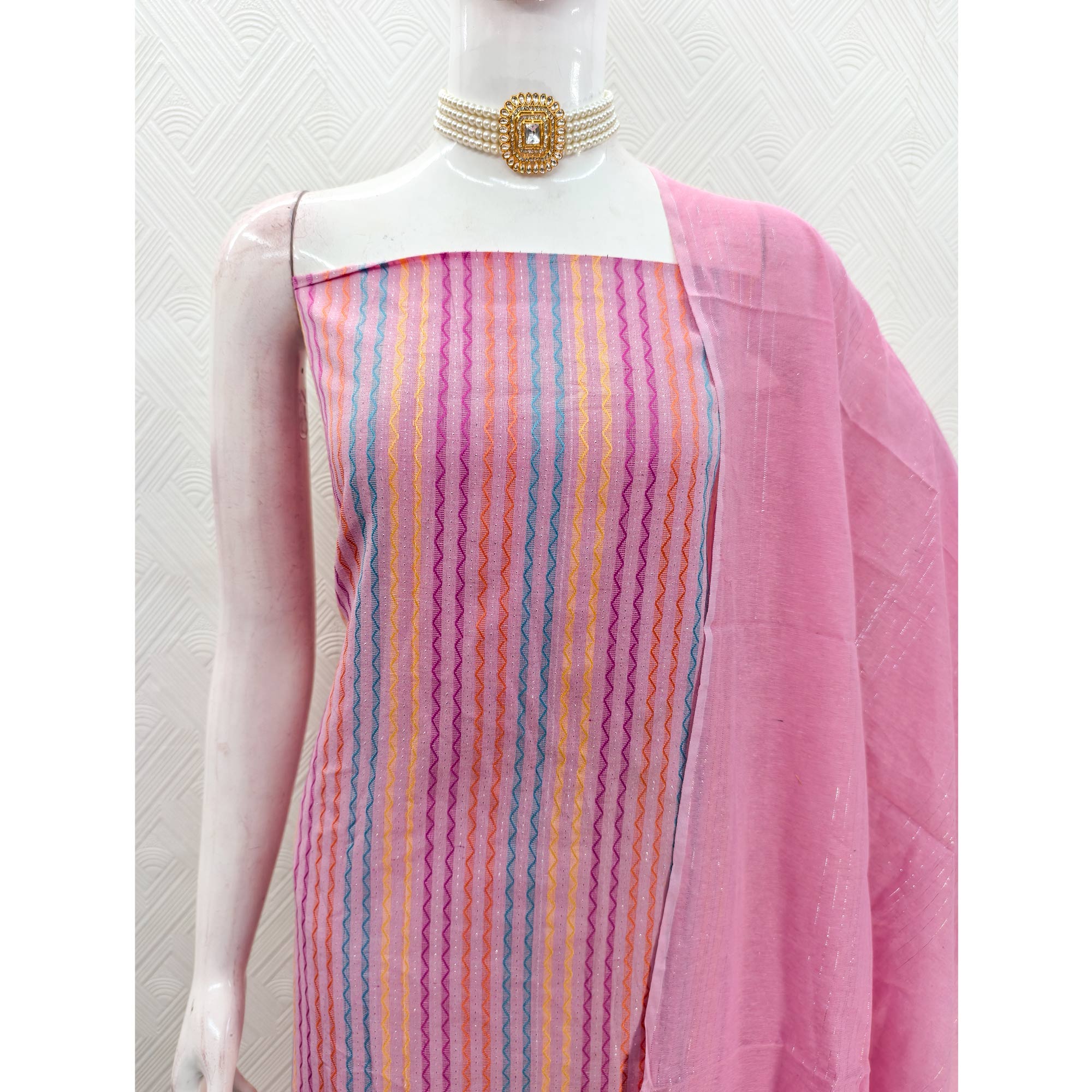 Pink Poly Cotton Blend Dress Material Highlighted With Striped Woven Work