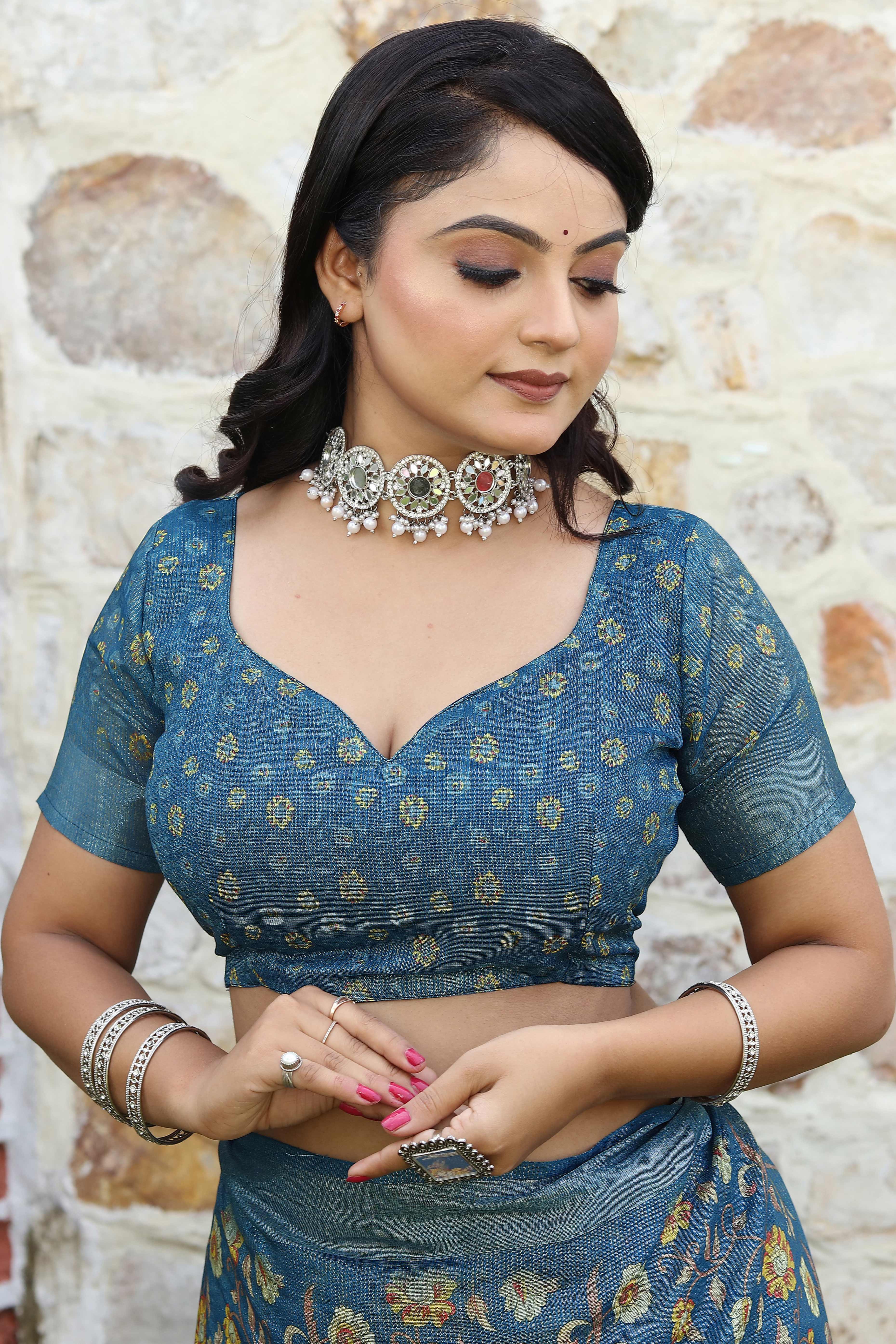 Beautiful Teal Tissue Handloom Saree with Detailed Digital Floral Embellishments