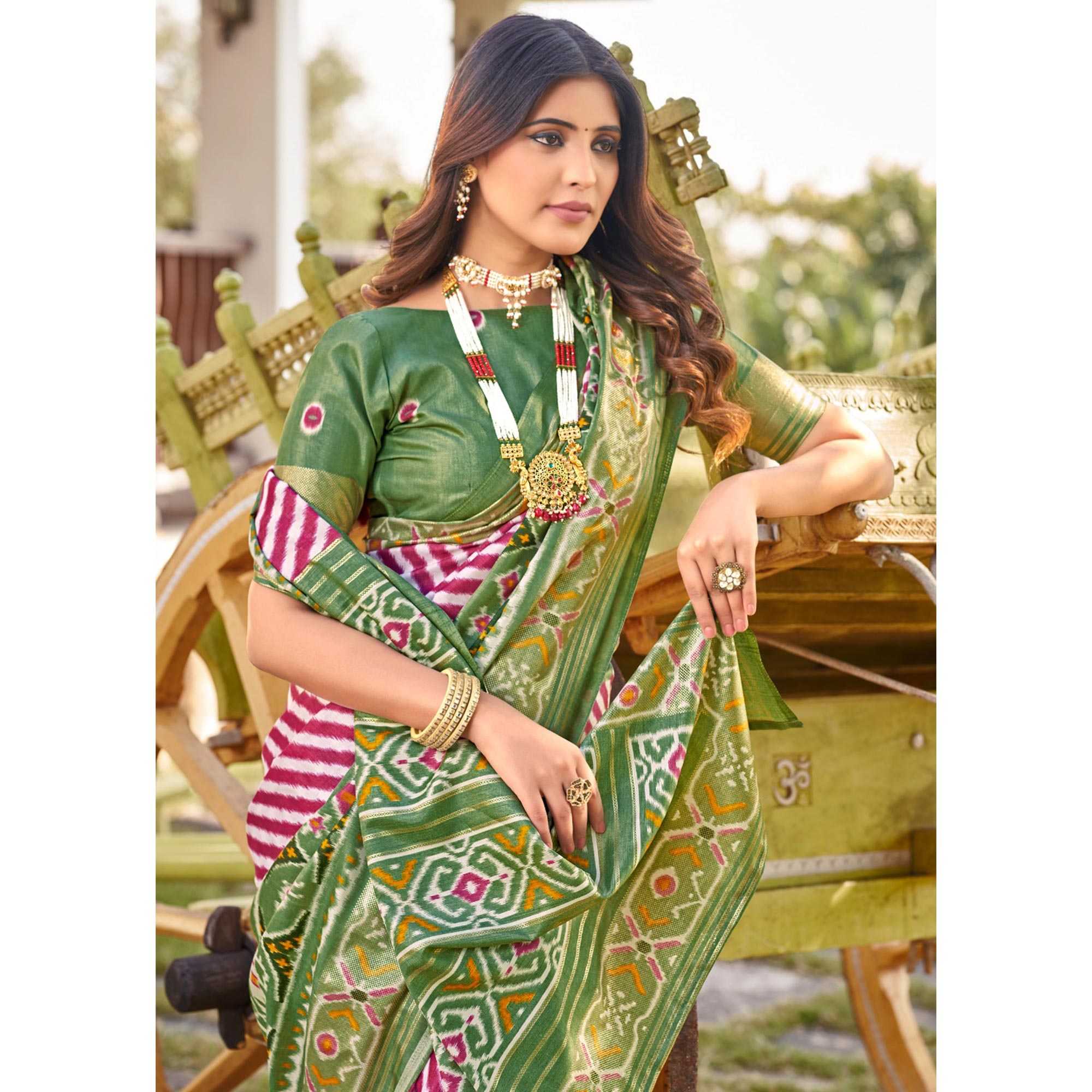 Green Patola Printed Dola Silk Saree