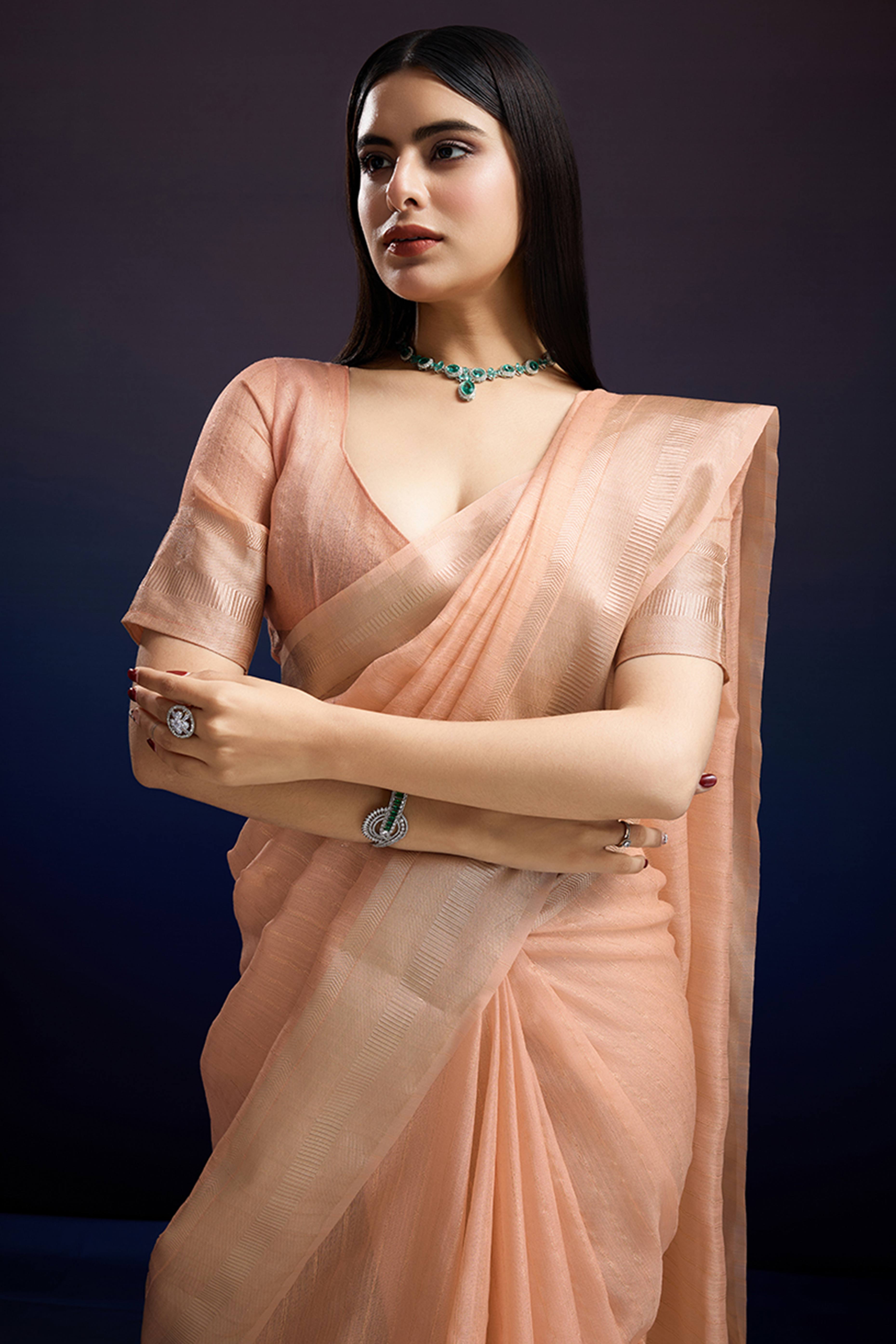 Festive Wear Peach Zari Woven Saree in Pure Linen Fabric