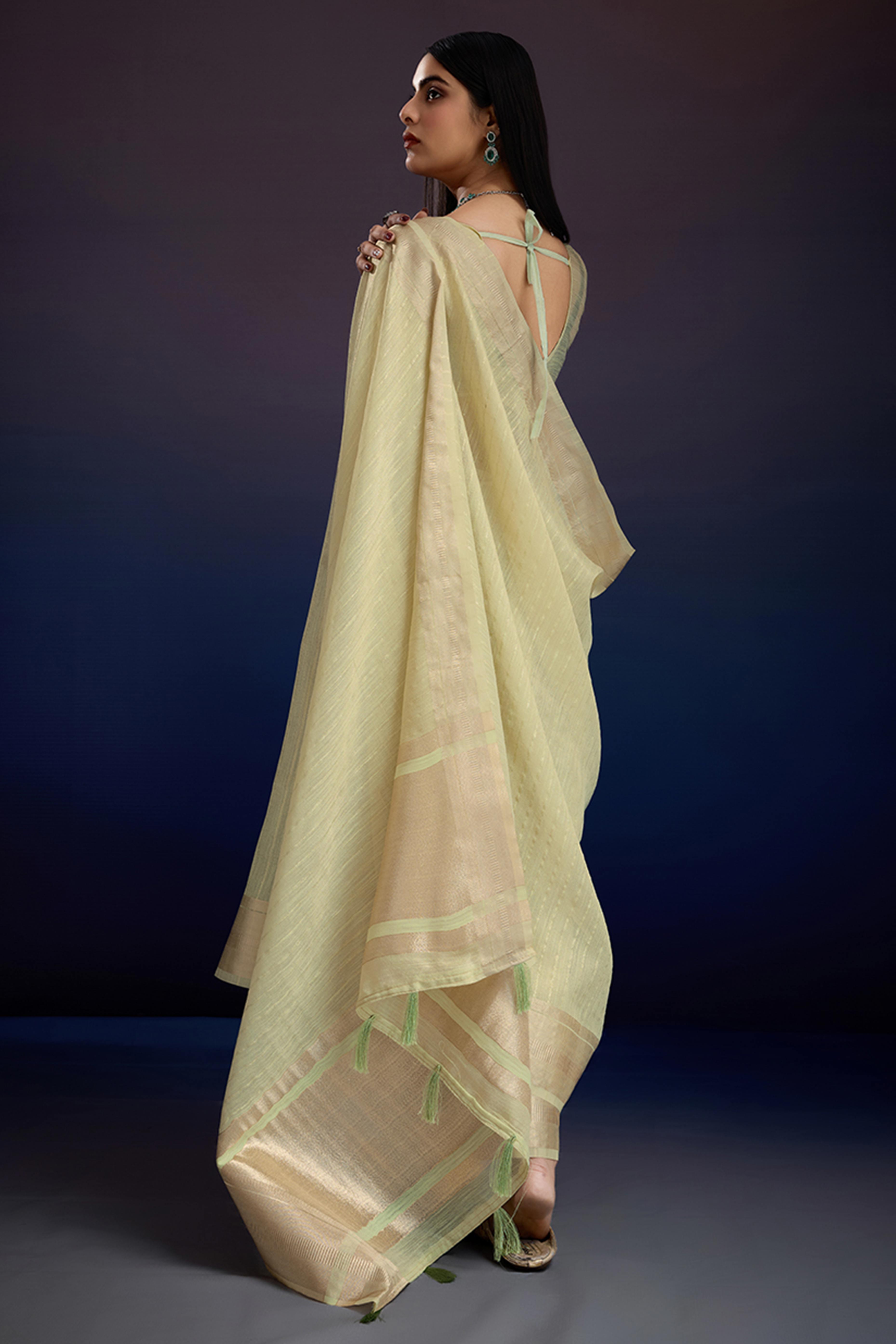 Festive Wear Green Zari Woven Saree in Pure Linen Fabric