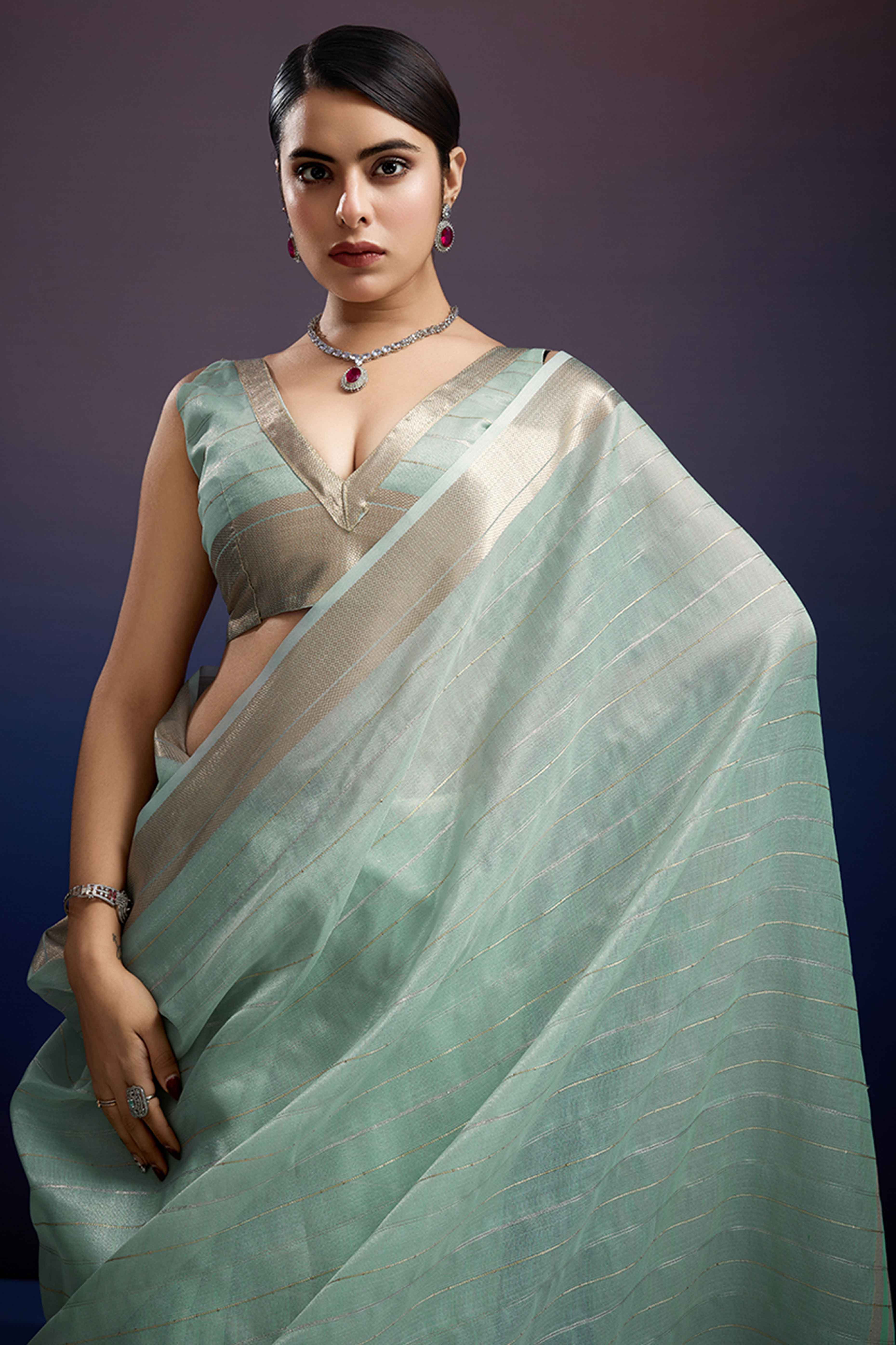 Mint Green Pure Linen Saree with Gold Toned Zari Weave