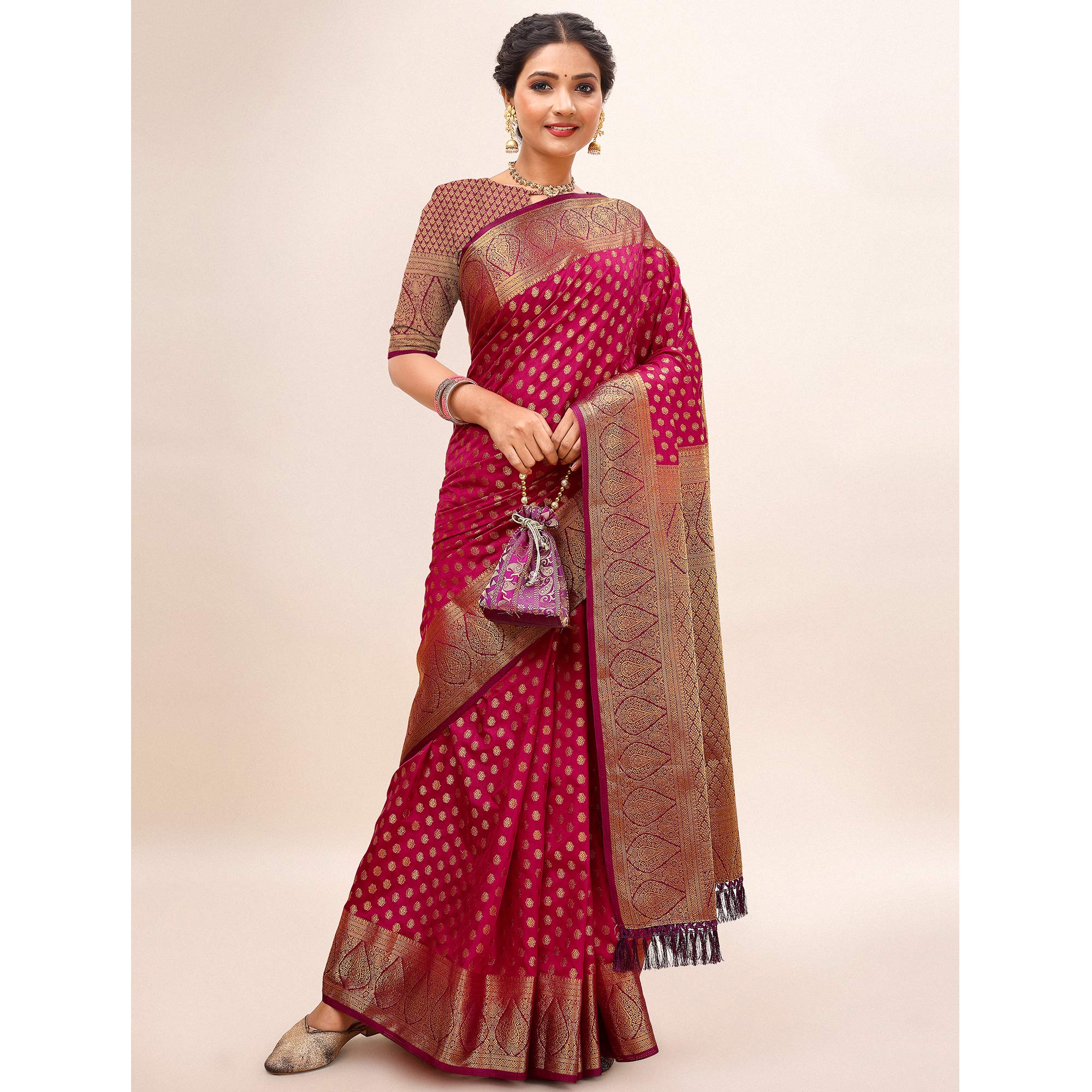 Rani Pink Woven Dola Silk Saree With Tassels