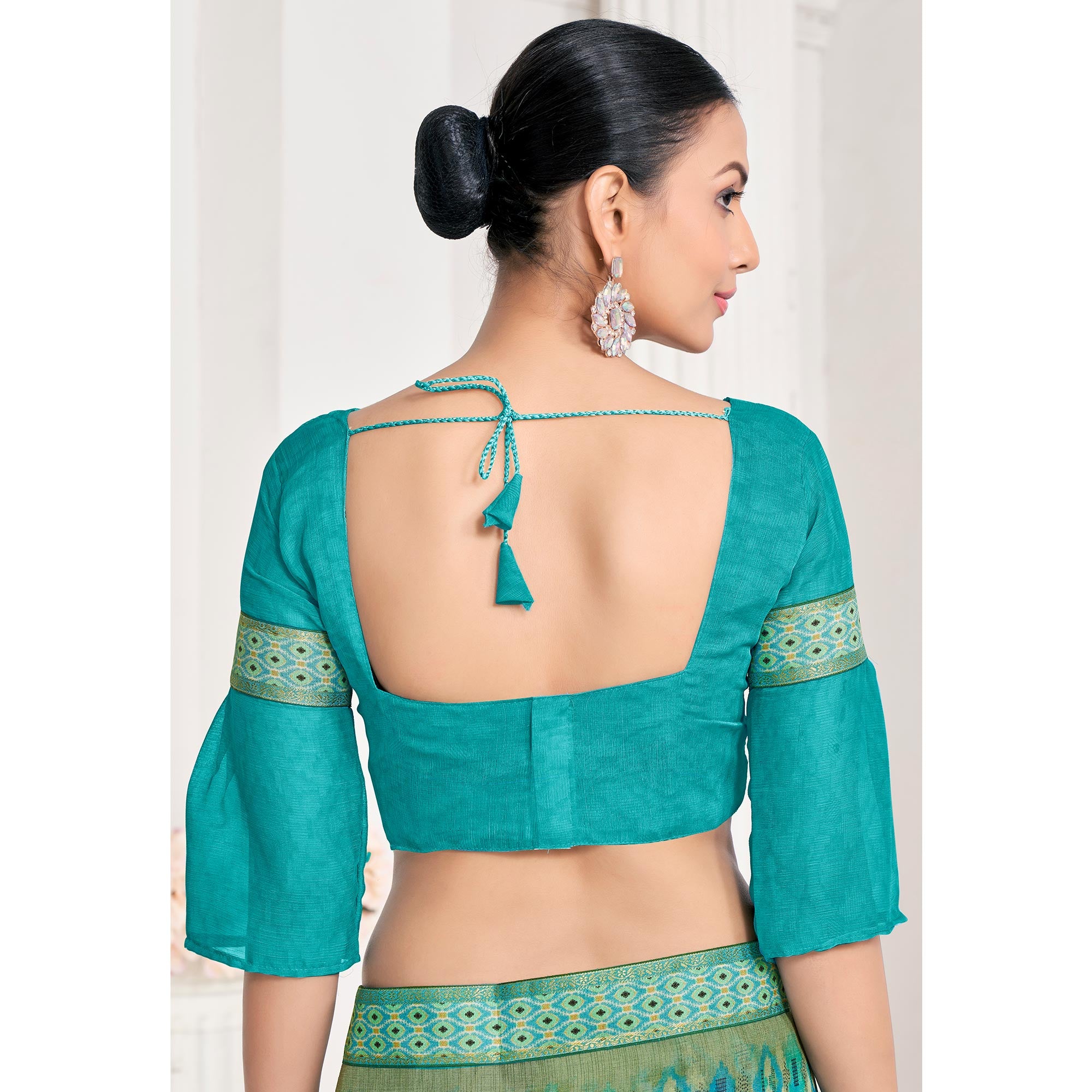 Turquoise Printed Chiffon Saree With Lace Border